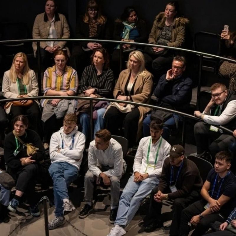 Audience sitting at an event held at Lava Show in Reykjavik