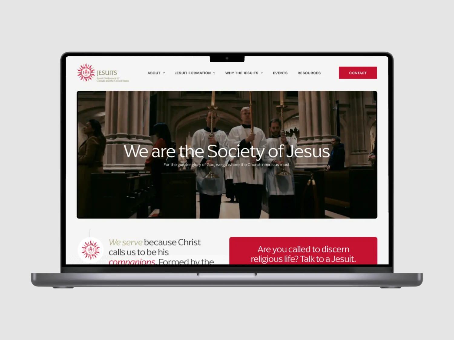 A laptop screen displaying a website with a performance or event, featuring a group of musicians on stage.