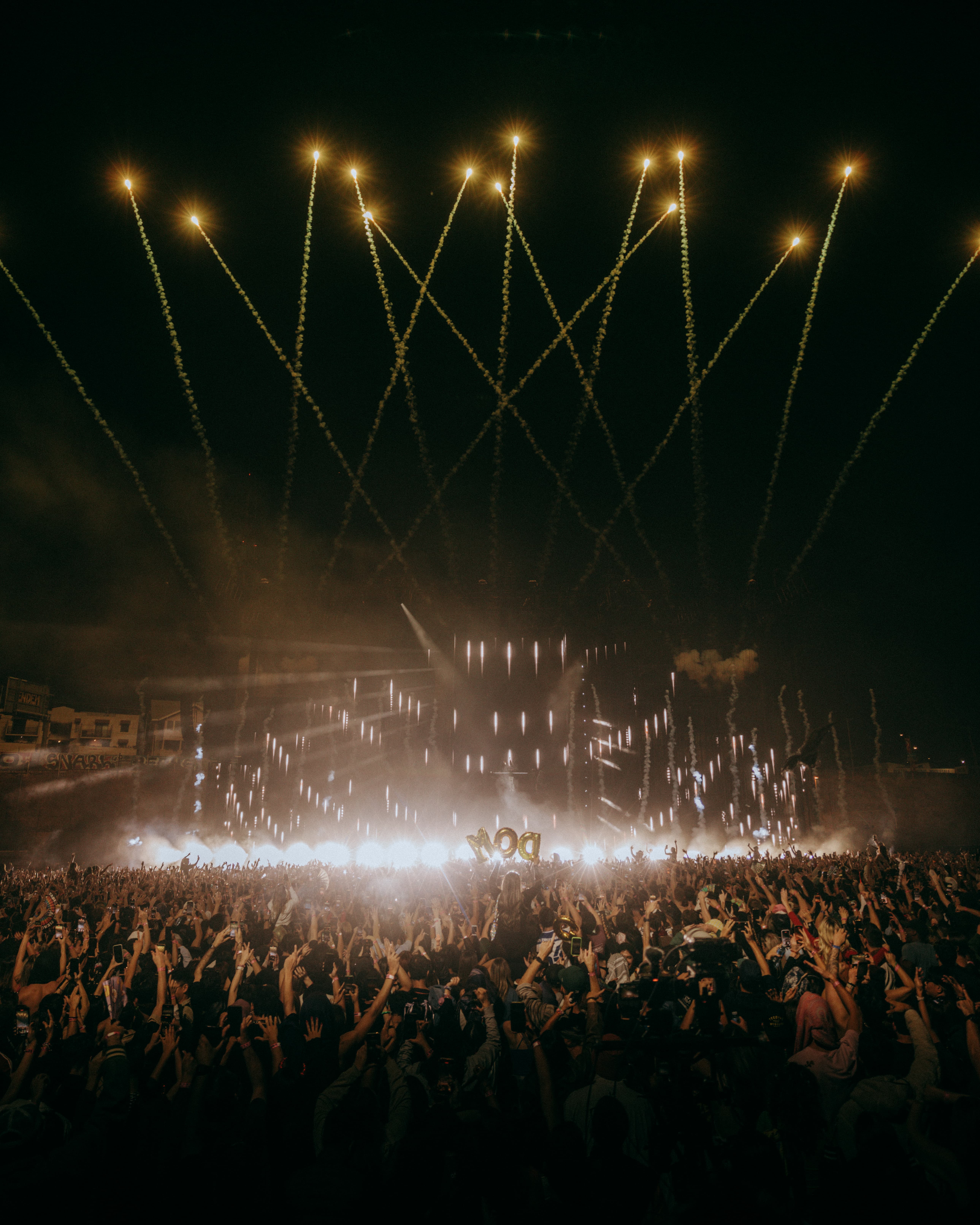 Fireworks erupt above a sold-out crowd as Dom Dolla closes out LA State Historic Park, captured by Brandon Densley of A World Away