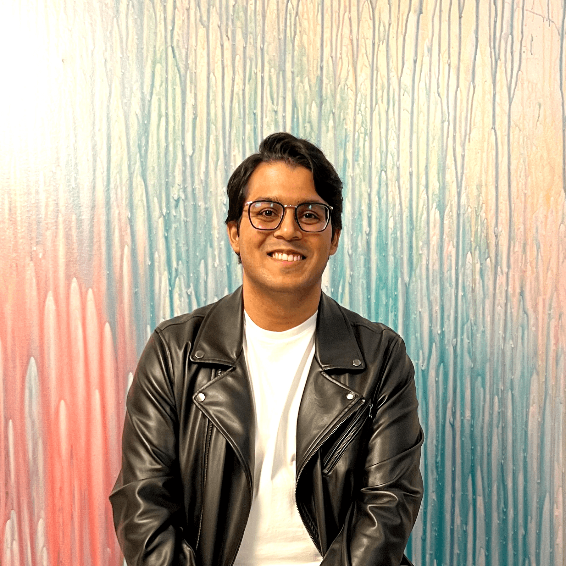 photo of adi against colorful backdrop