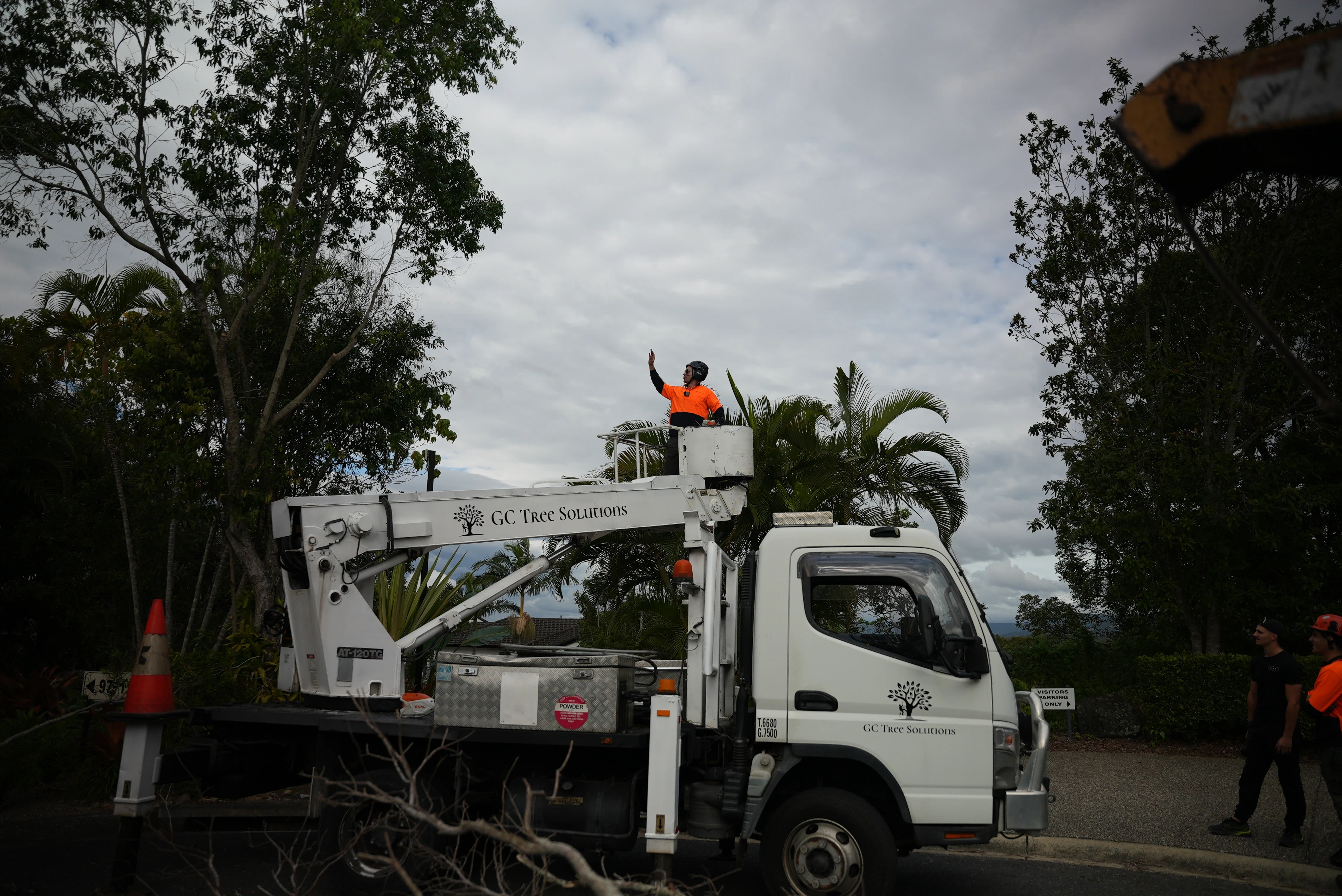 GC Tree Solutions truck with an elevated work platform in use