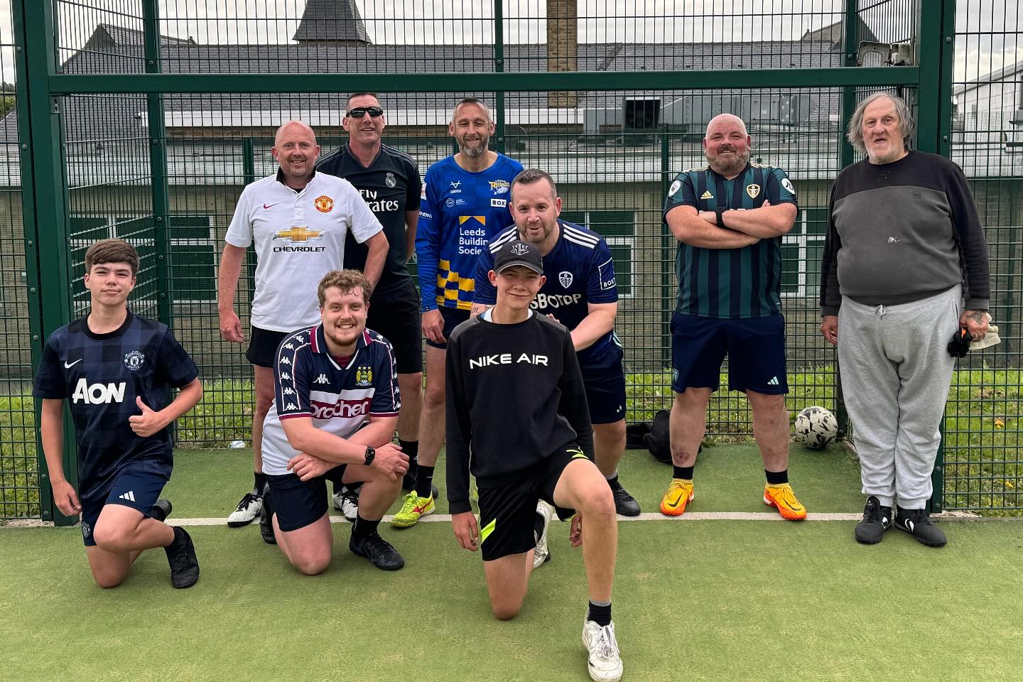 a group of boys in football uniforms