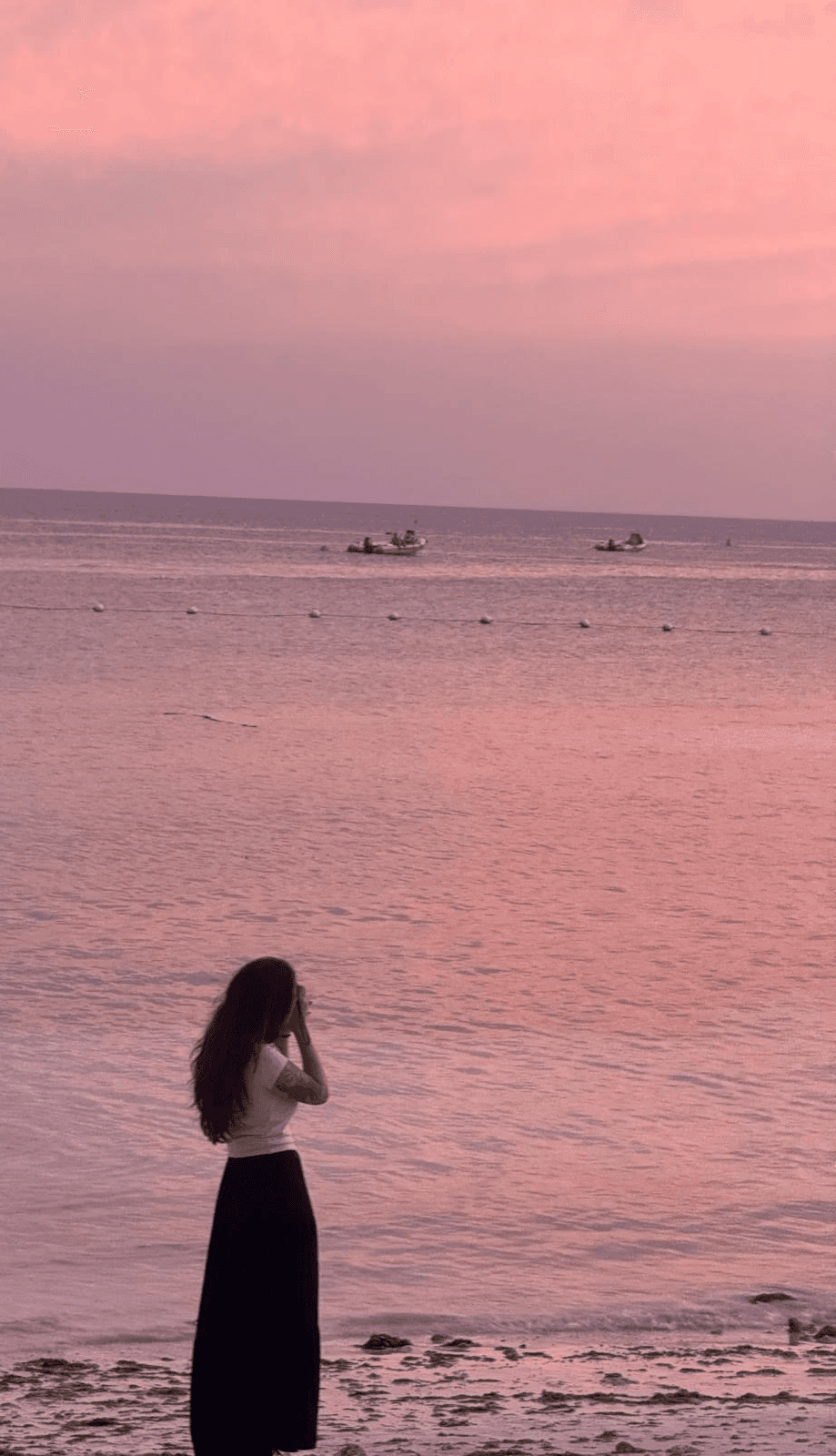 Yo en Filipinas tomando una foto a un atardecer