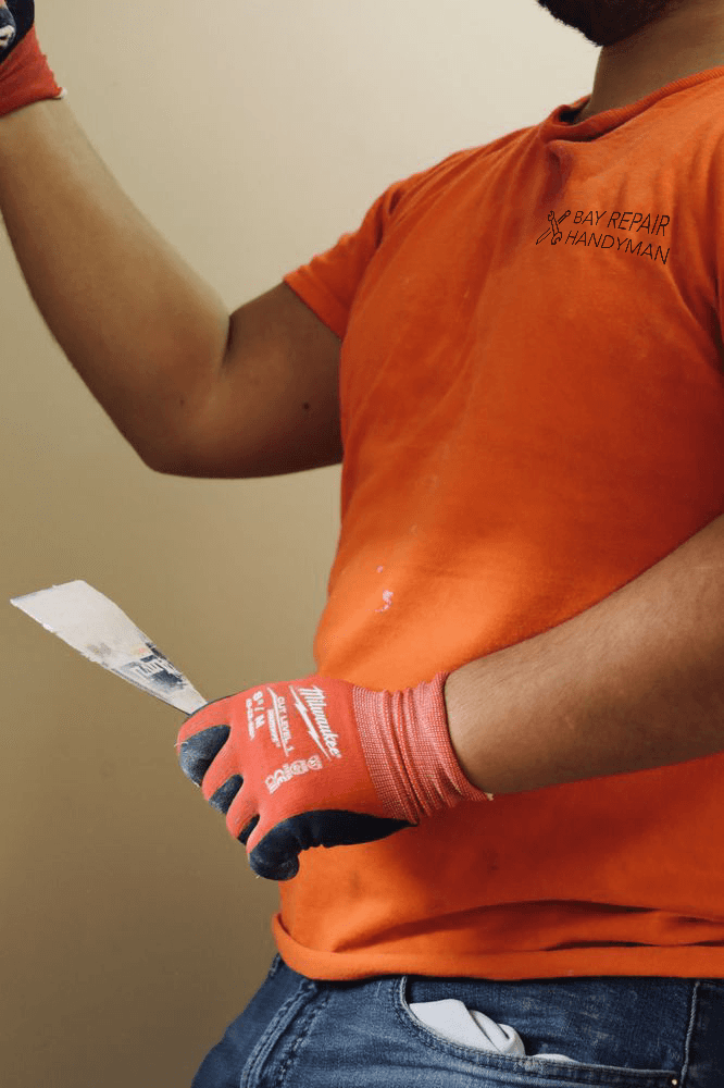 Expert Aura Duct Care technician performing thorough air duct cleaning at a client's residence in Huntington Beach, ensuring optimal indoor air quality.