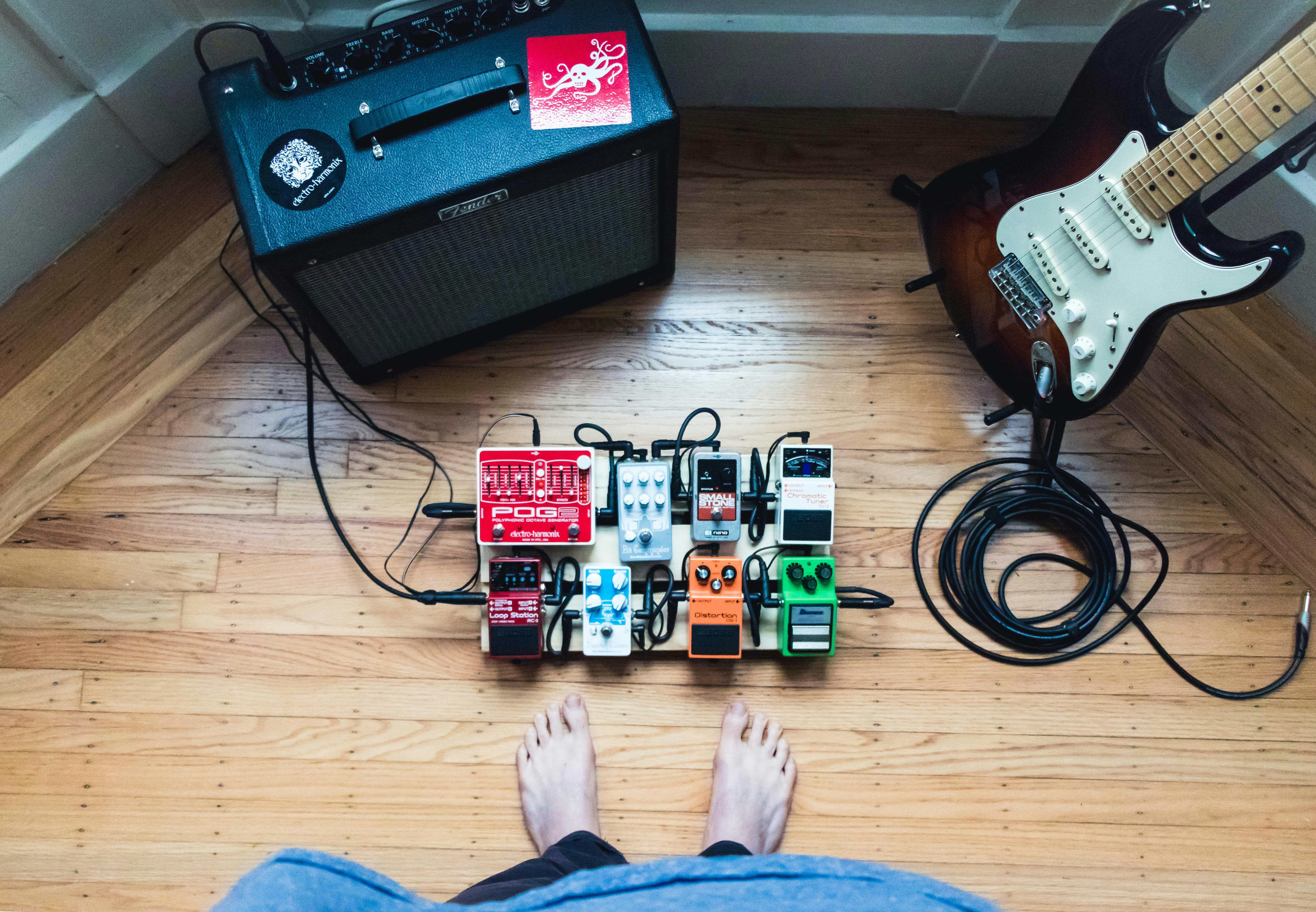 man in his mini studio - Music Production Books