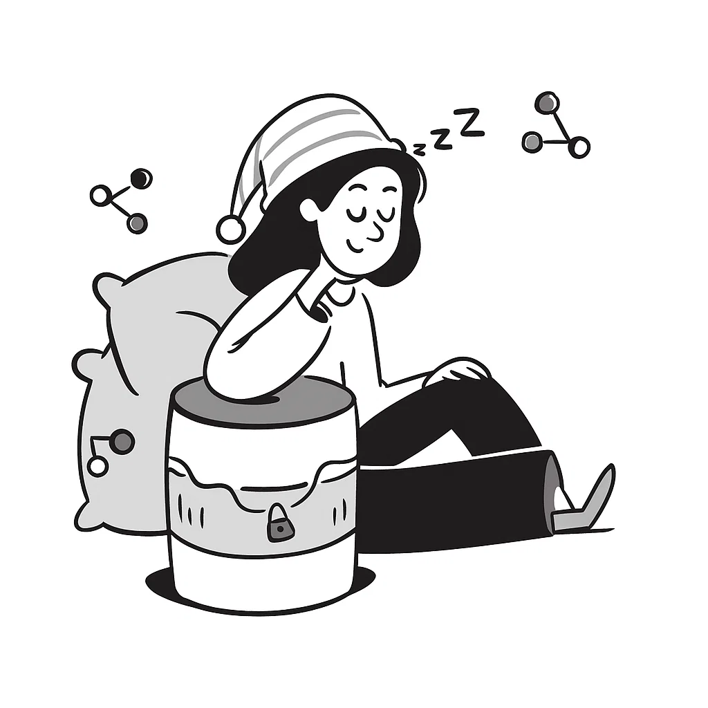 clear drinking glass with coffee on top of white table