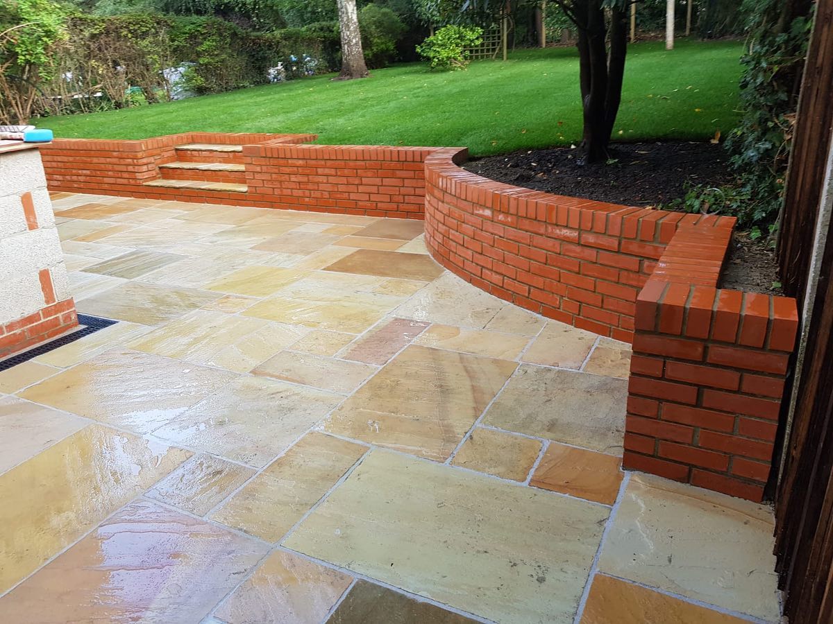 Paved garden patio and brick edging
