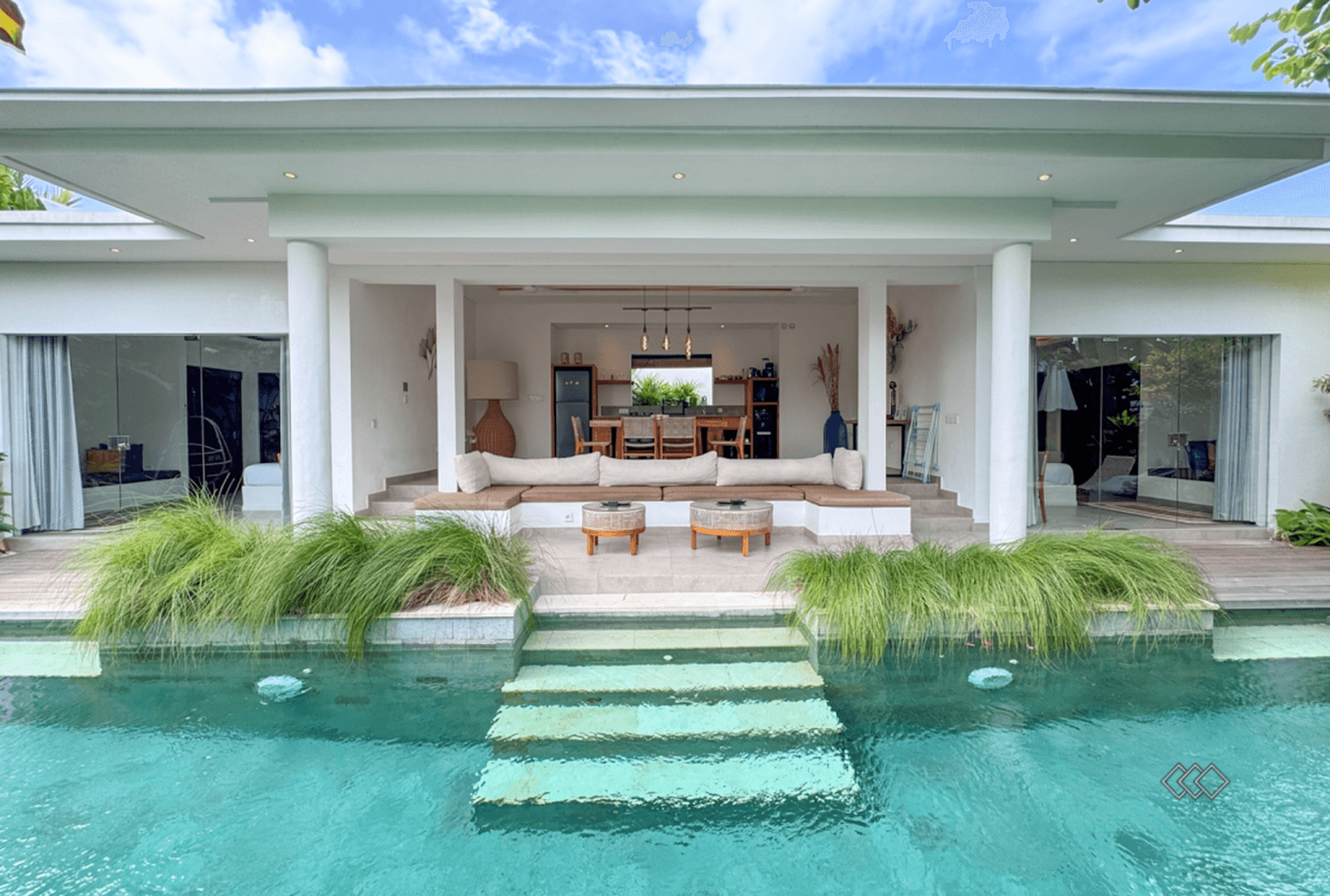 Exterior view of a luxury Nyanyi Beach home. Professional real estate services for premium Bali beachfront rentals.