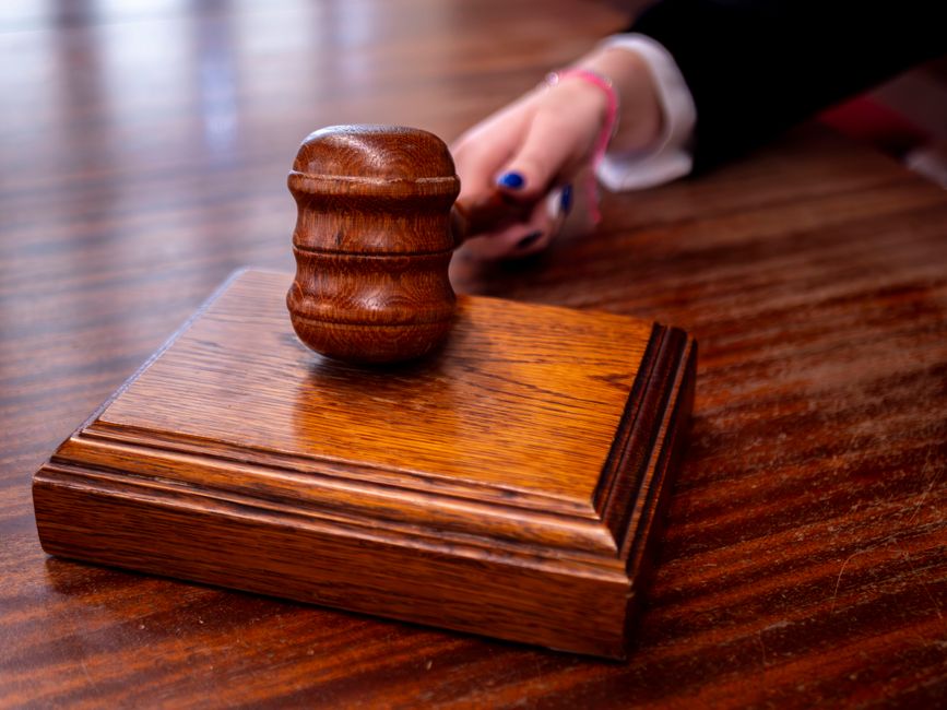 courtroom gavel, summons, and complaint