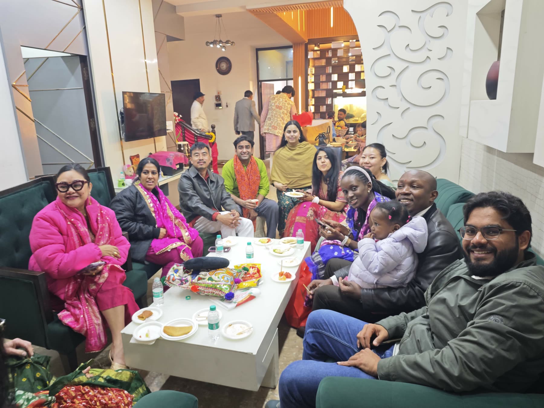 A large family group gathered indoors