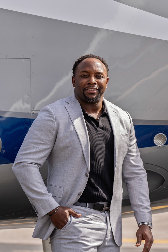 person sitting in a chair in front of a man