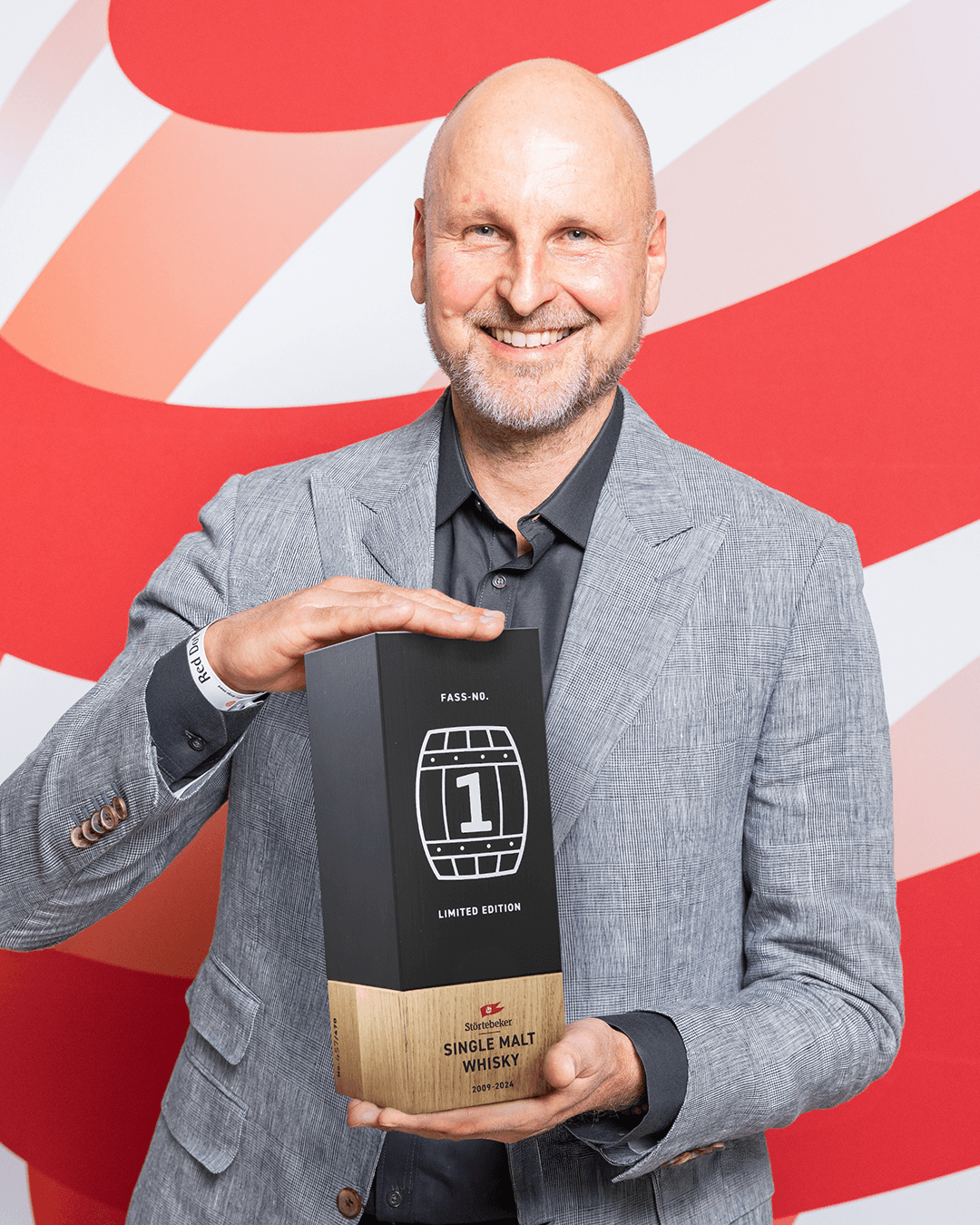 Man holding limited edition single malt whisky box