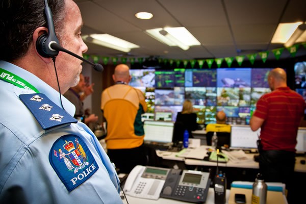 A group of people sitting on the steps of a building