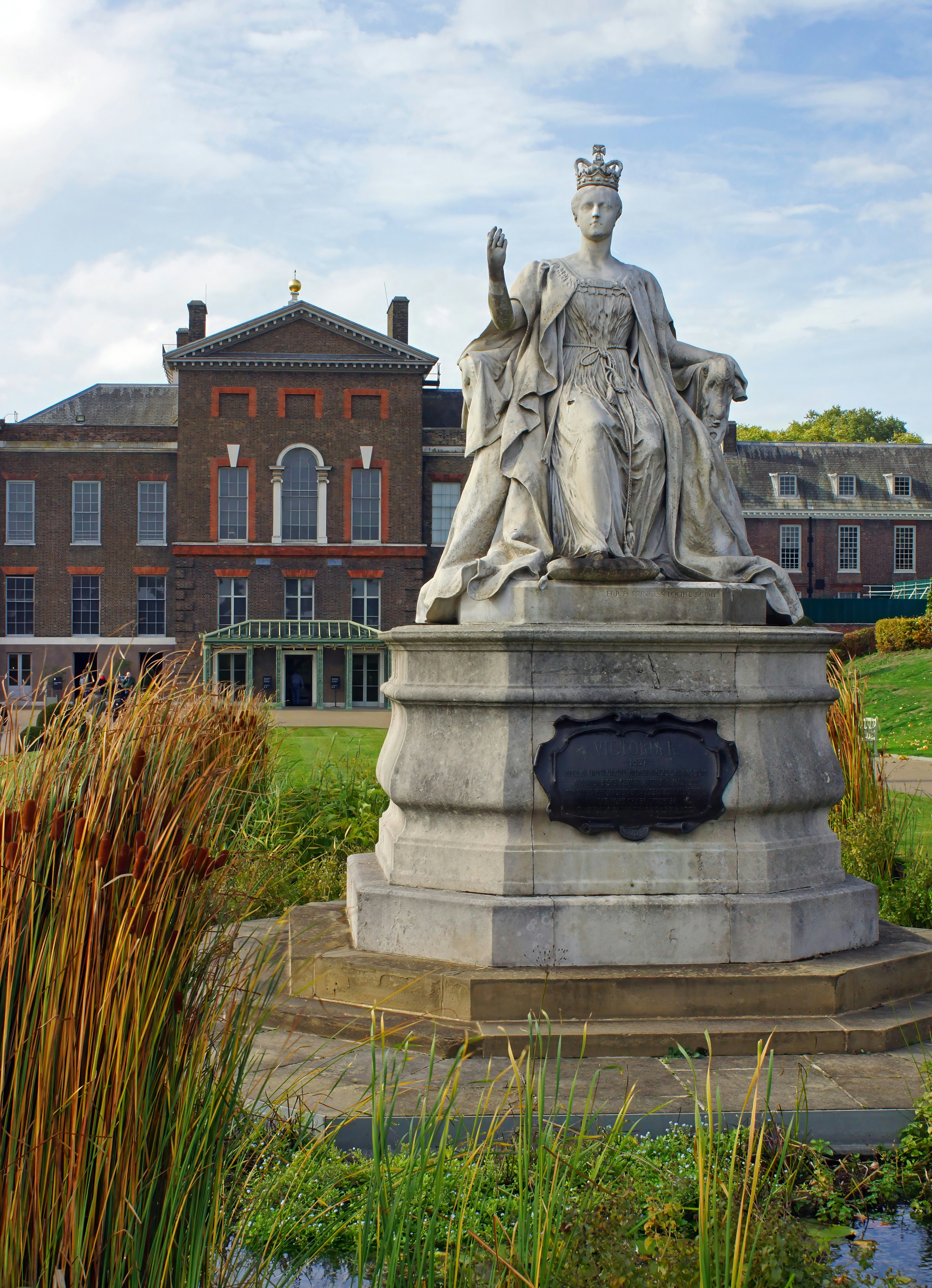 Statue of Queen Victoria outside of Kensington Palace in London.