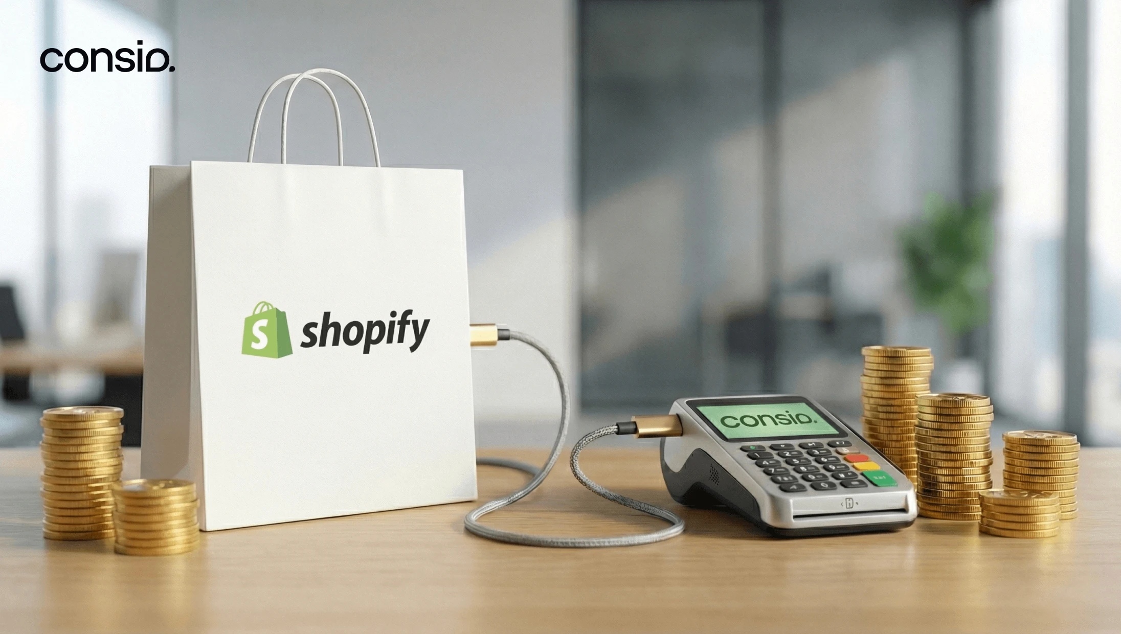 A white shopping bag with the Shopify logo connected via a data cable to a payment terminal displaying the Consio logo, surrounded by stacks of gold coins to symbolize revenue growth