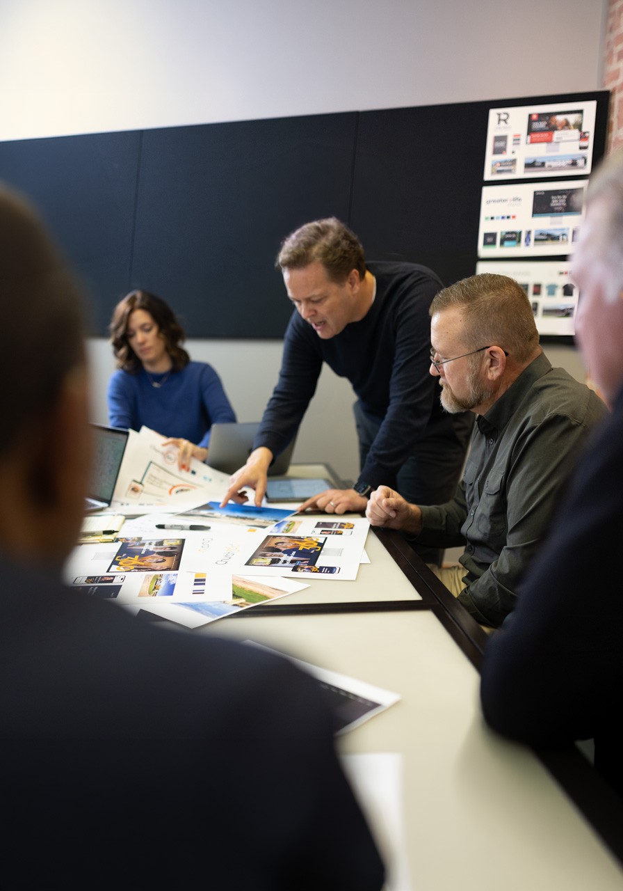 Strategic Team Looking At Brand Concepts