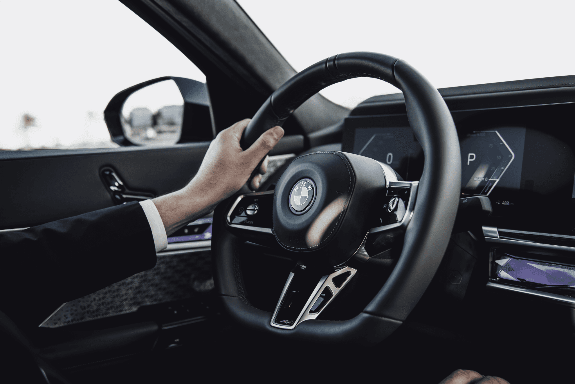 Chauffeur holding the steering wheel