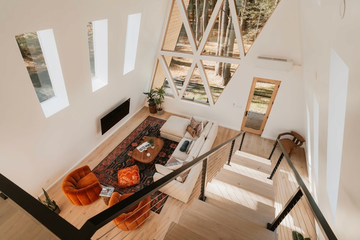 Modern mountain cabin living room with large windows
