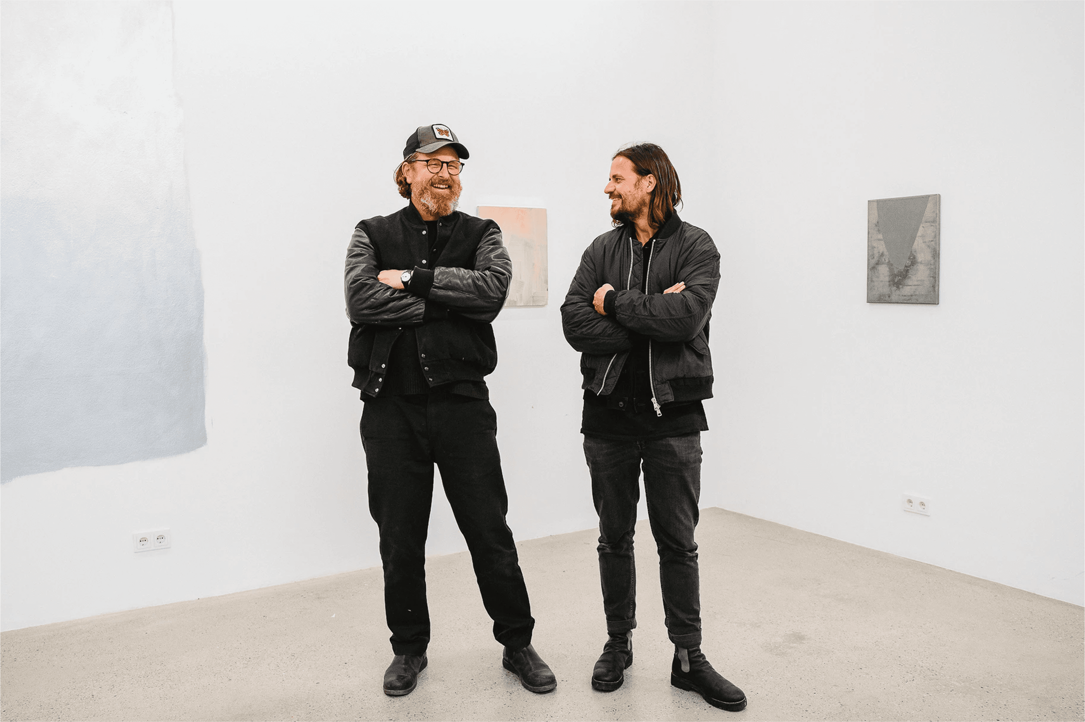 Chair with champagne and glasses by window.