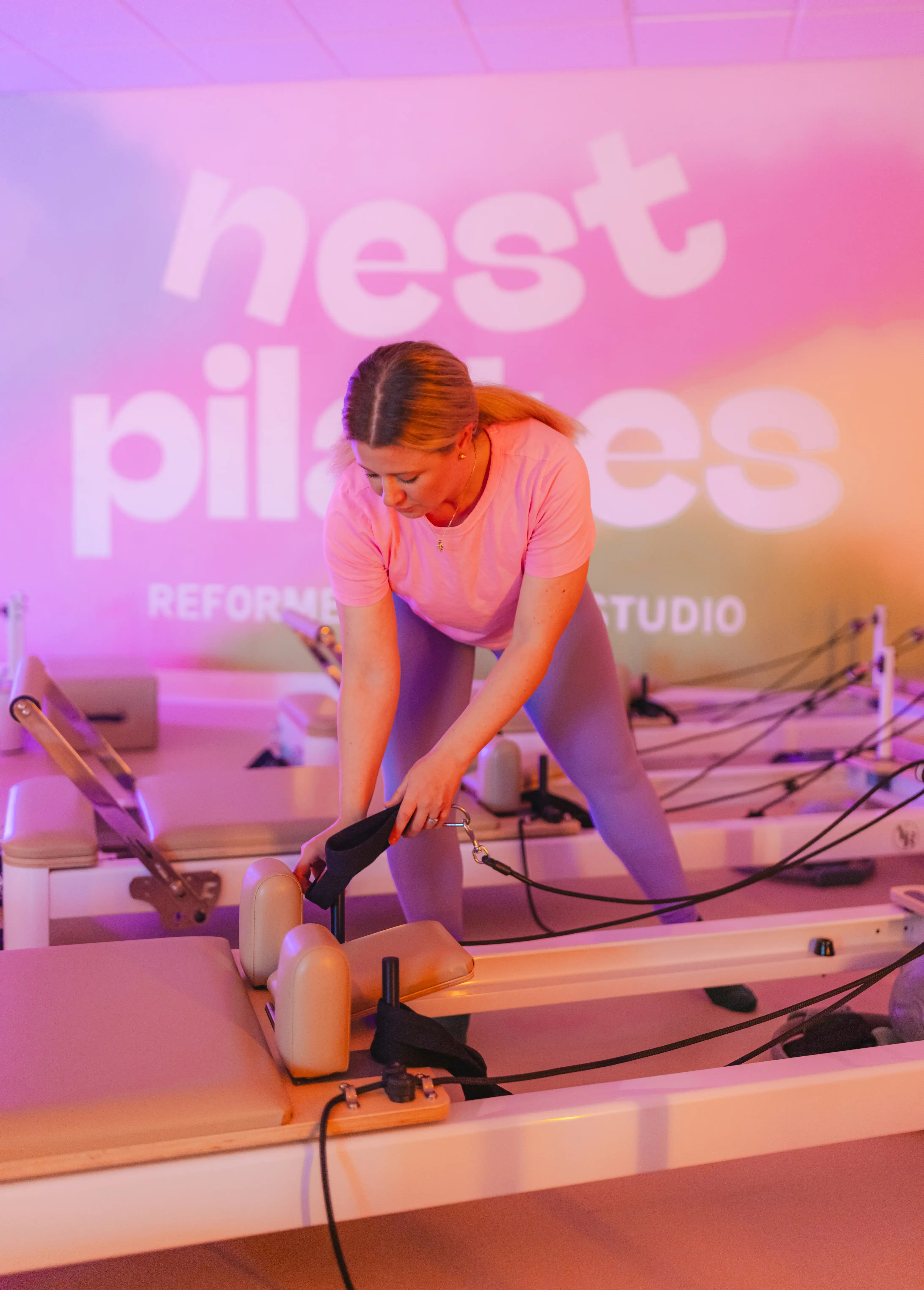 Nest Pilates team member portrait
