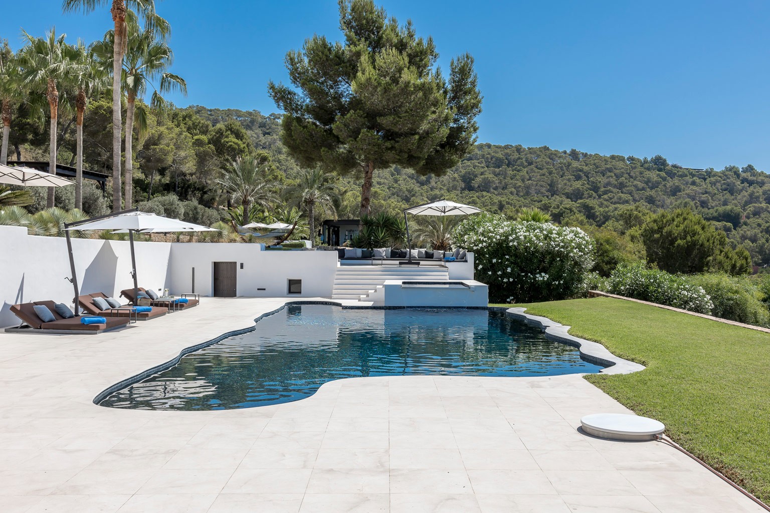 Daytime pool view at the exclusive luxury villa in Ibiza—privacy-focused VIP estate property holiday retreat for weddings and events.
