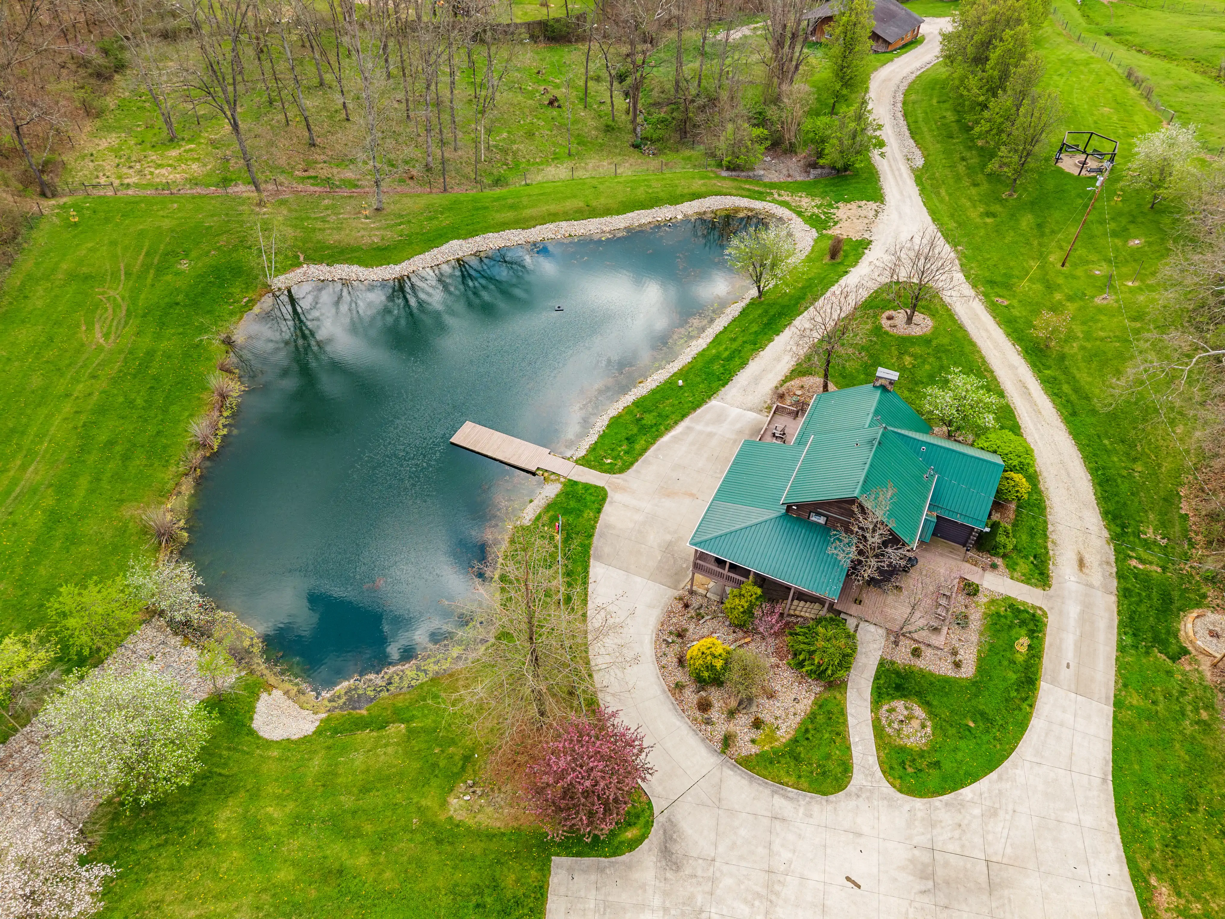 aerial shot of a ohio lakehome in summer