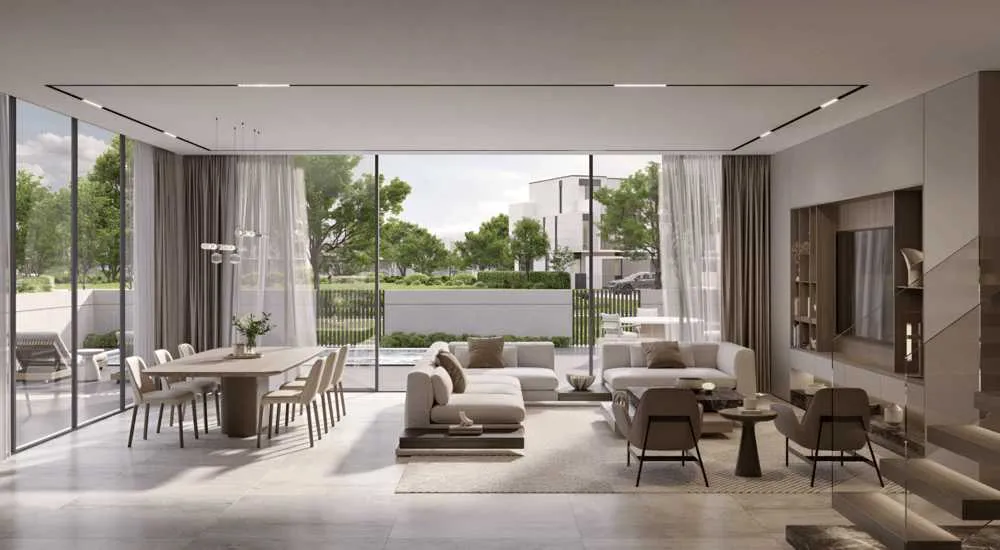 Modern living room in Living Legends 5 furnished with sleek furniture, showcasing a stylish and contemporary design.