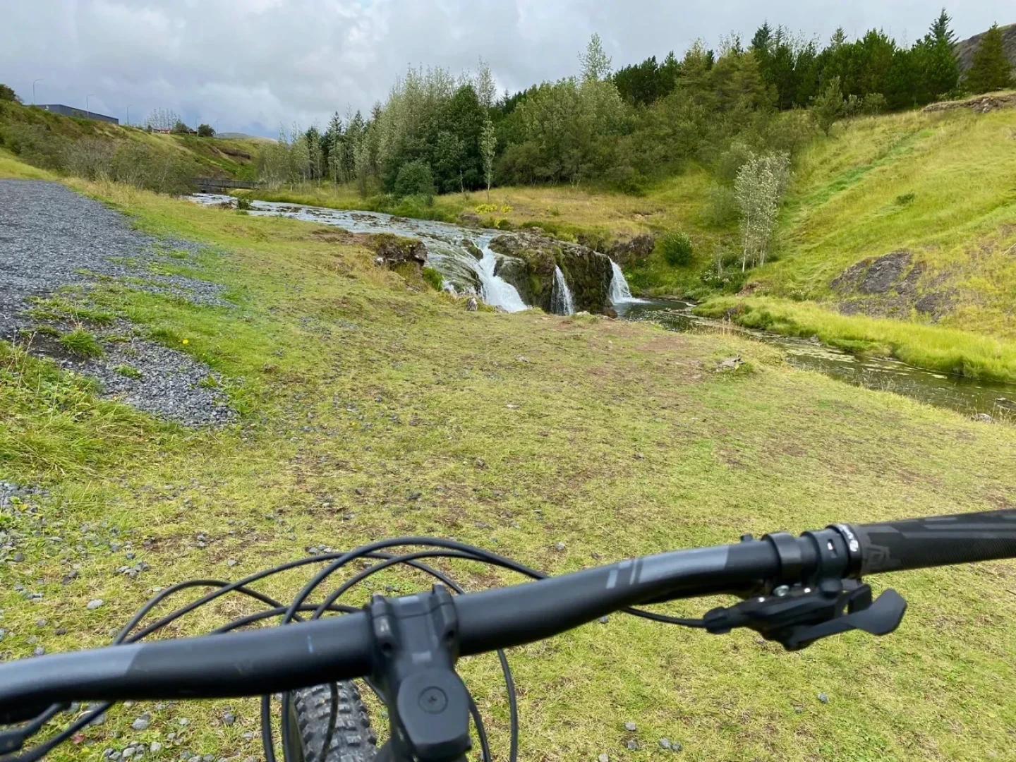 View of a waterfall from a bike