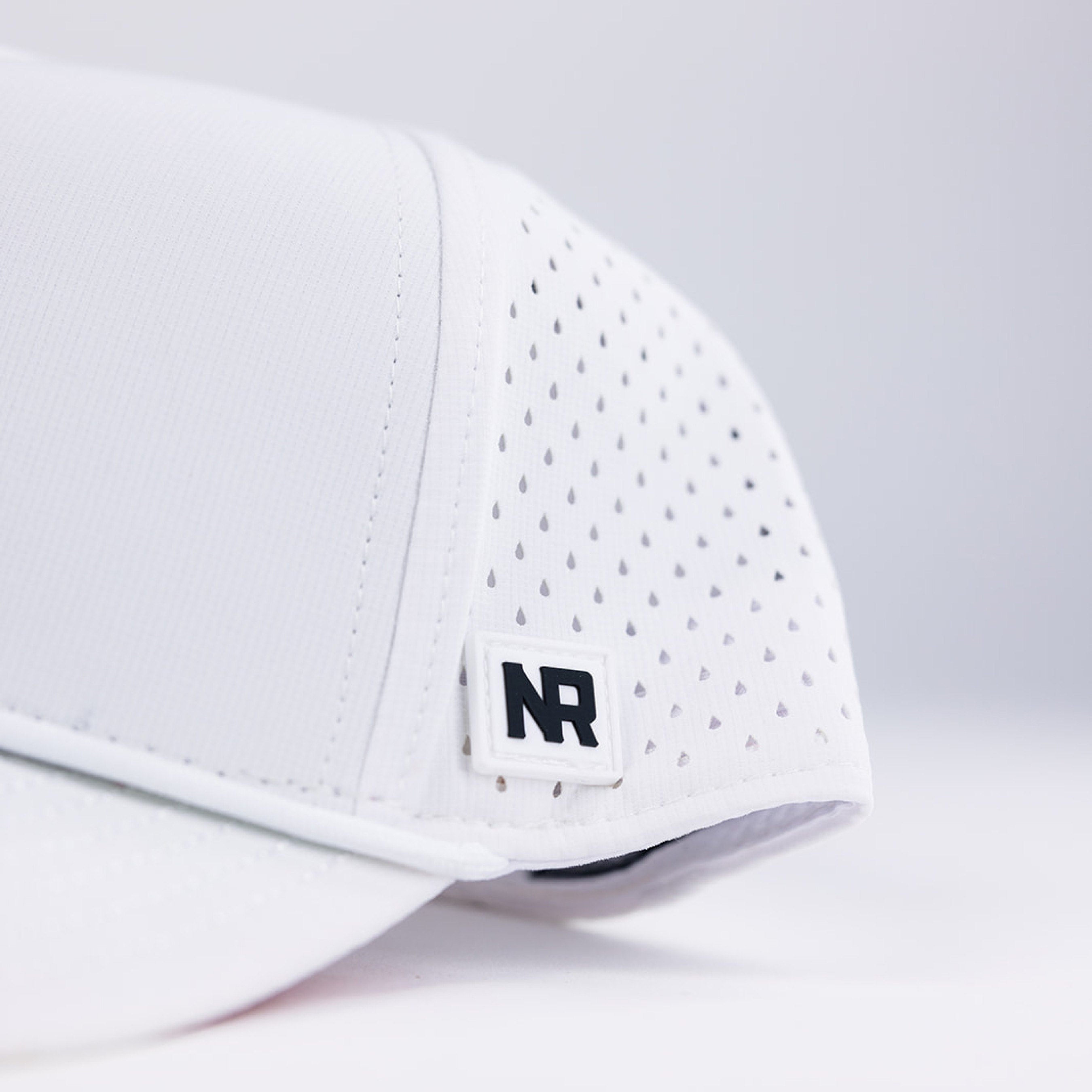 Streetside billboard with flyposters of the Batch.Works brand and illustrations