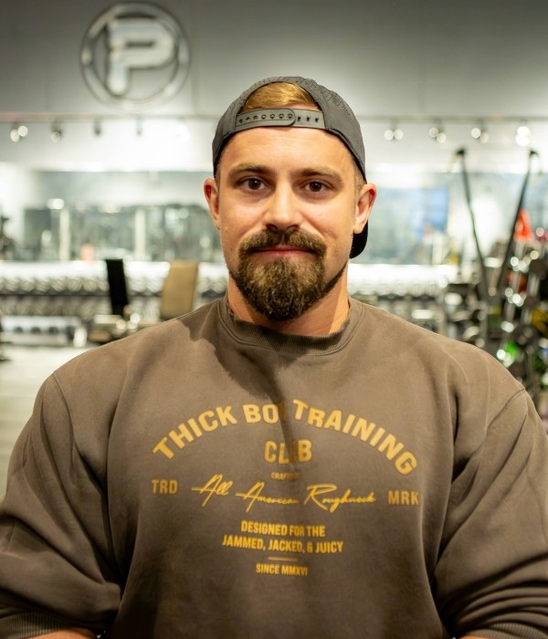 black and gray dumbbells on brown wooden crate