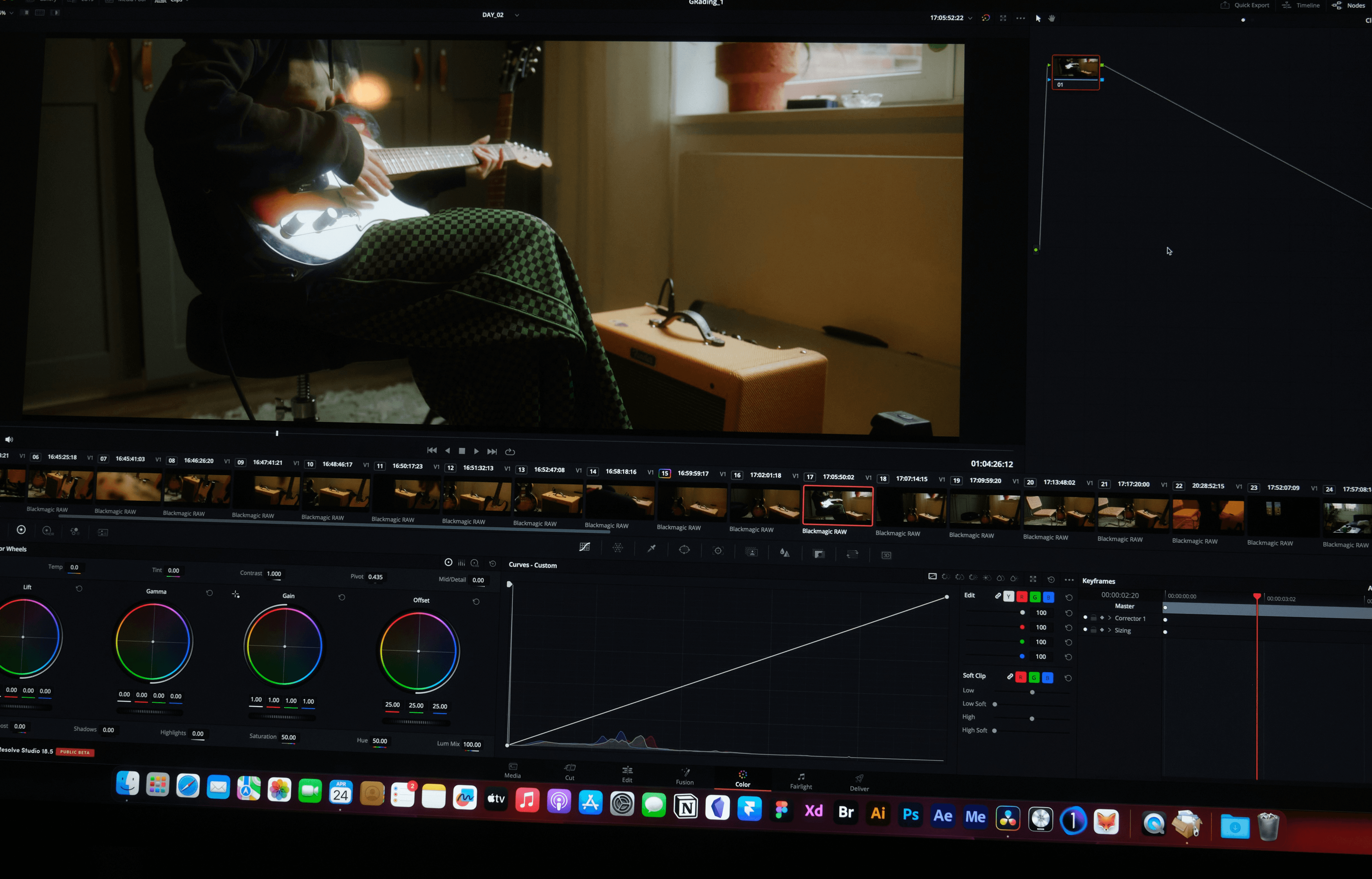 a computer screen showing a man sitting in a chair