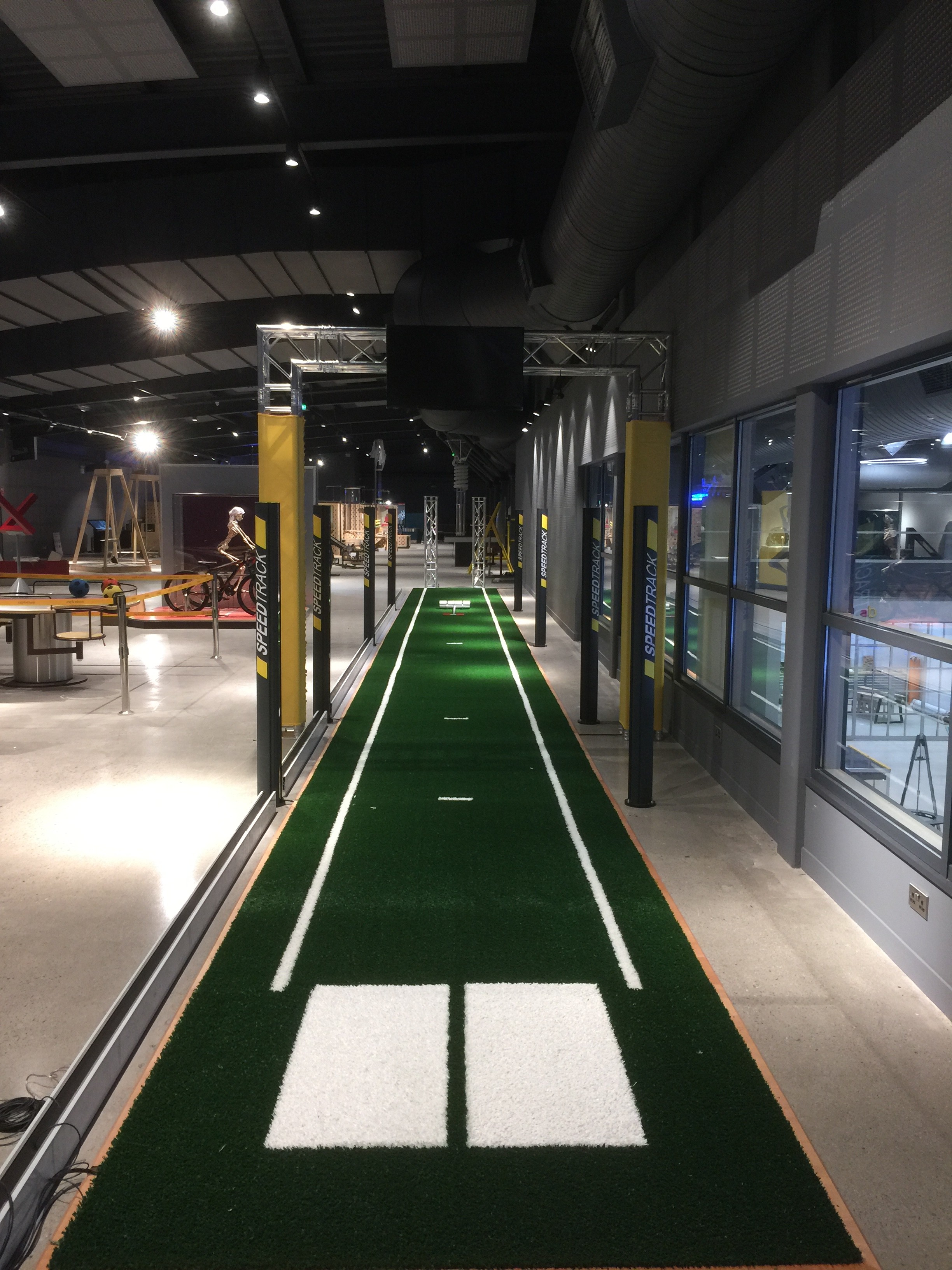 a man in a black shirt is playing frisbee