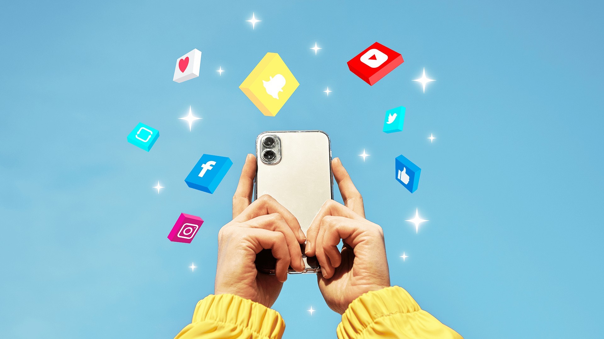 hands holding a phone with social media icons around it including youtube logo, snapchat logo, facebook logo, instagram logo,twitter logo, like icon, and love icon