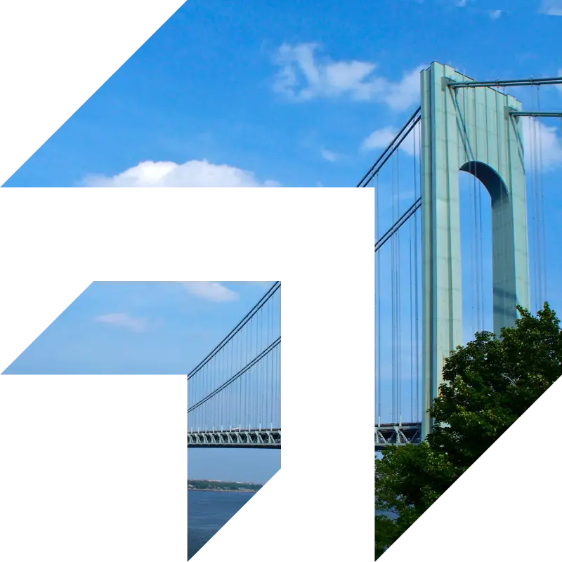 A bridge under a clear blue sky symbolizing strong connections and smooth processes — representing GIA Group, LLC’s commitment to helping truckers streamline and speed up their insurance claims.