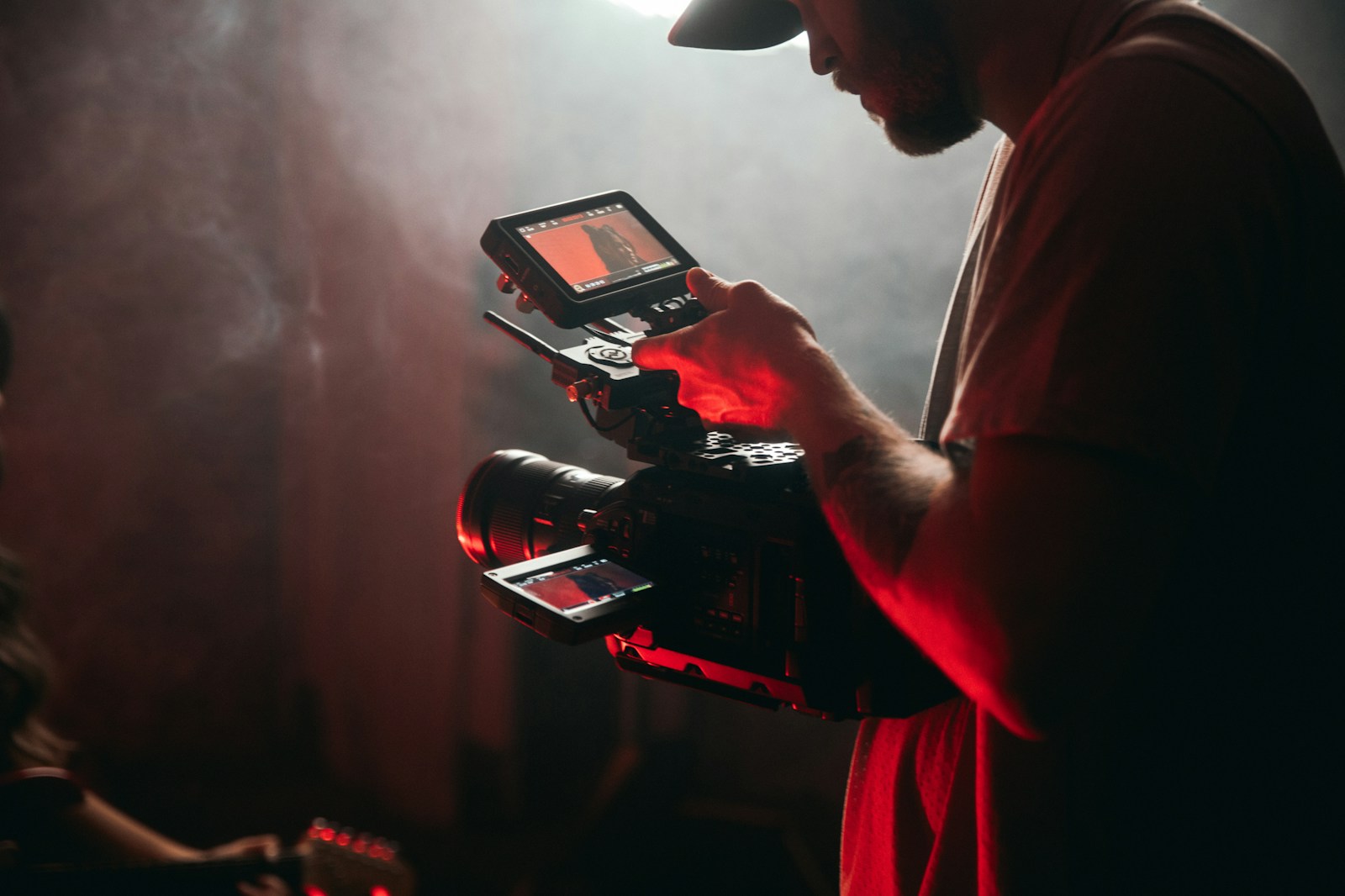 Camera operator preparing for a shoot