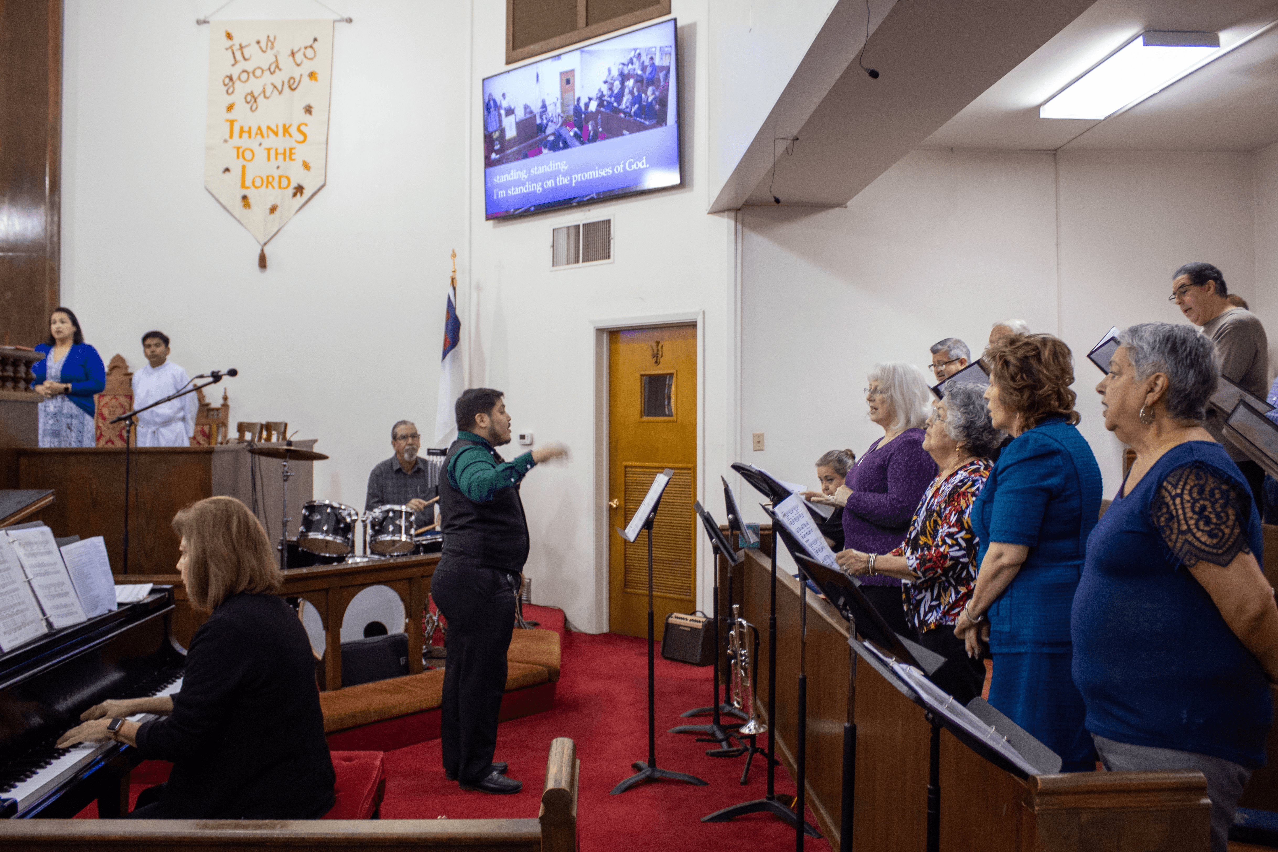image of church choir being led by director