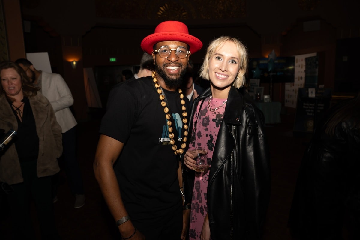 Jared Oluwa posing for a picture while volunteering at the Guild of Music Supervisors Awards.