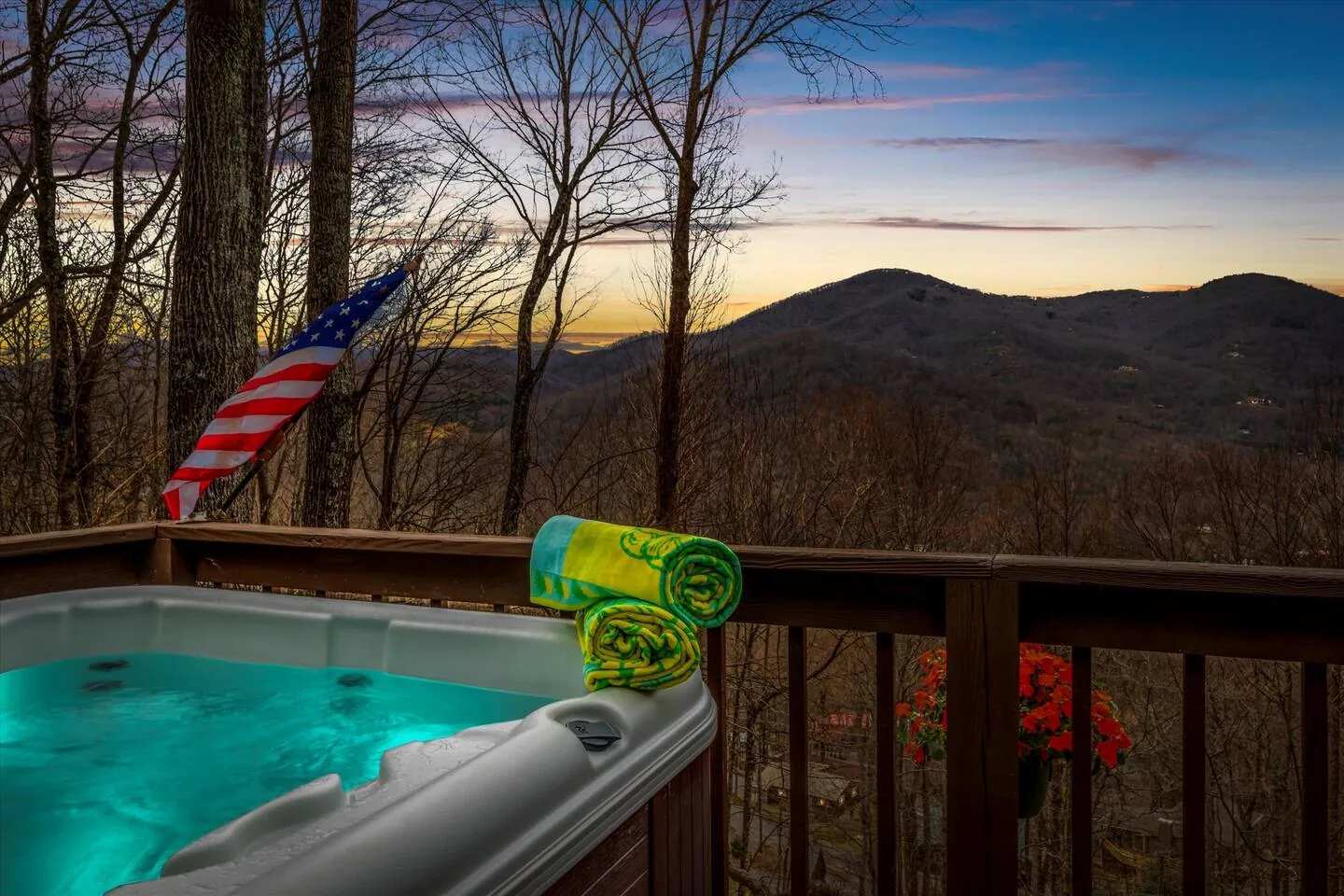 Bella Vista hot tub on the deck at sunset, mountains beyond