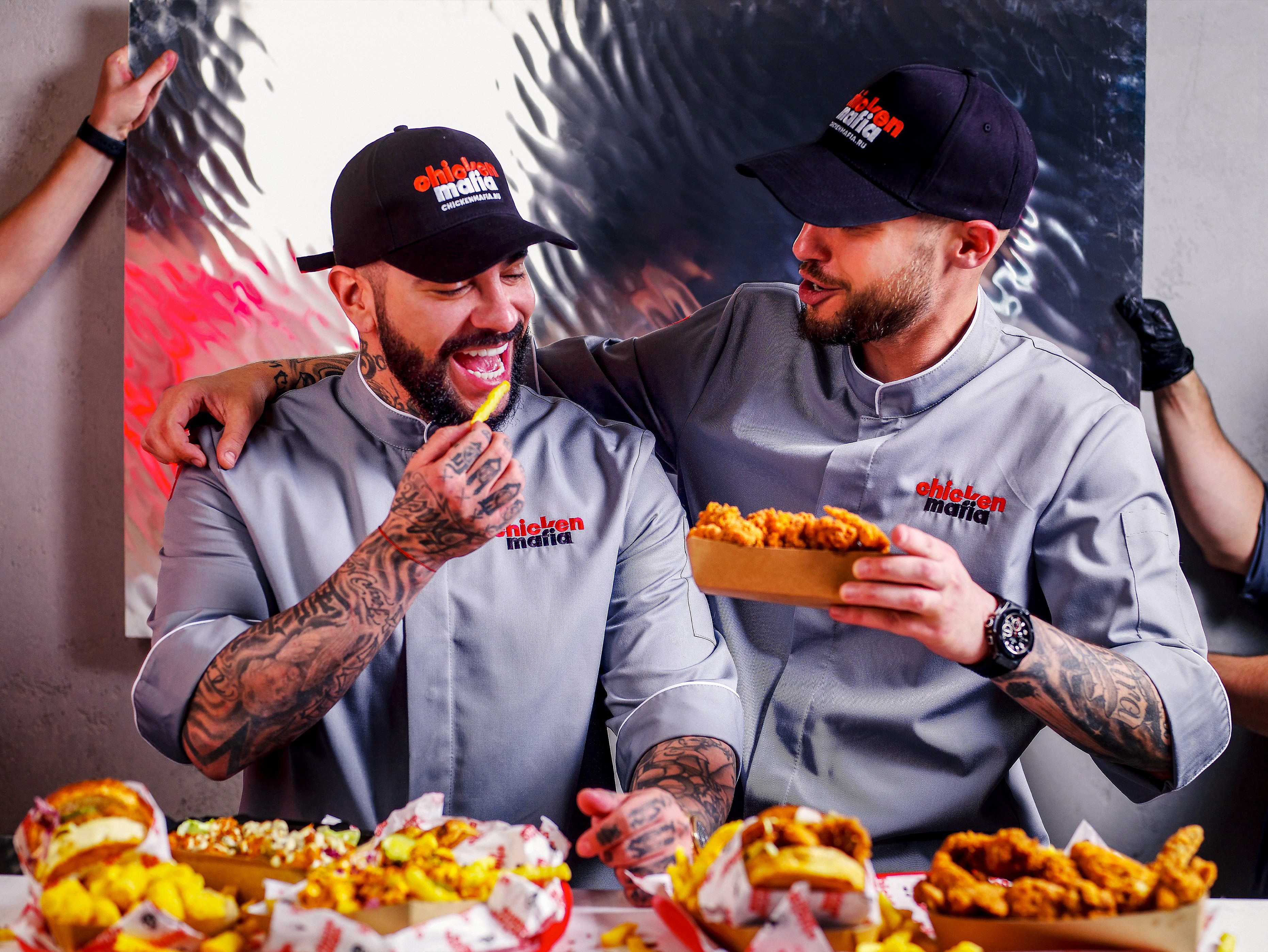 Batch.Works logo over a photo of a box of 3D printed objects