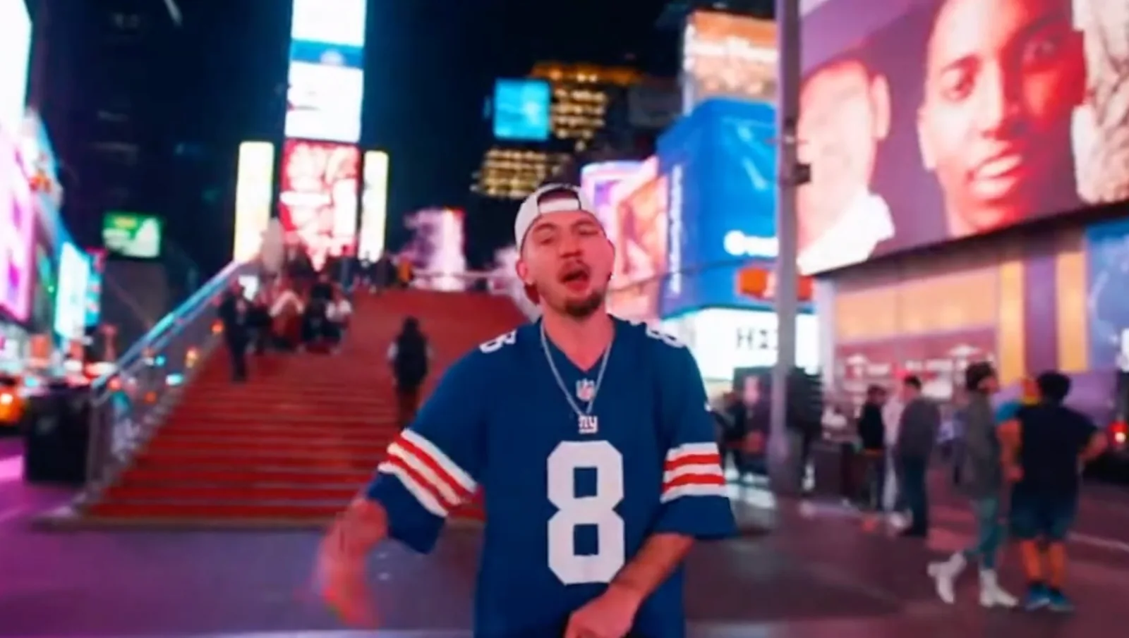 New York Giants jersey performer in Times Square in my experimental hip-hop video
