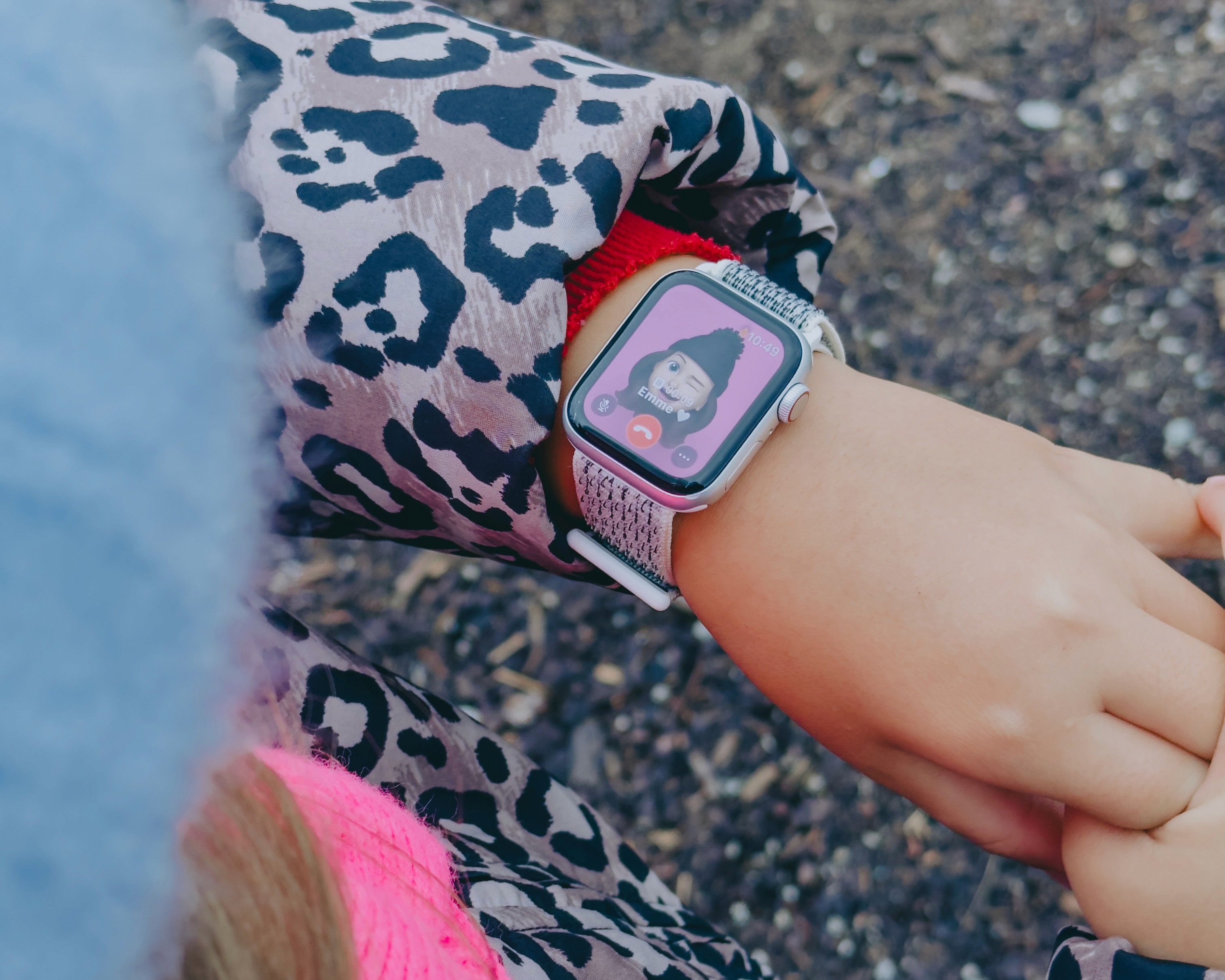 Child talking on the phone with Apple Watch