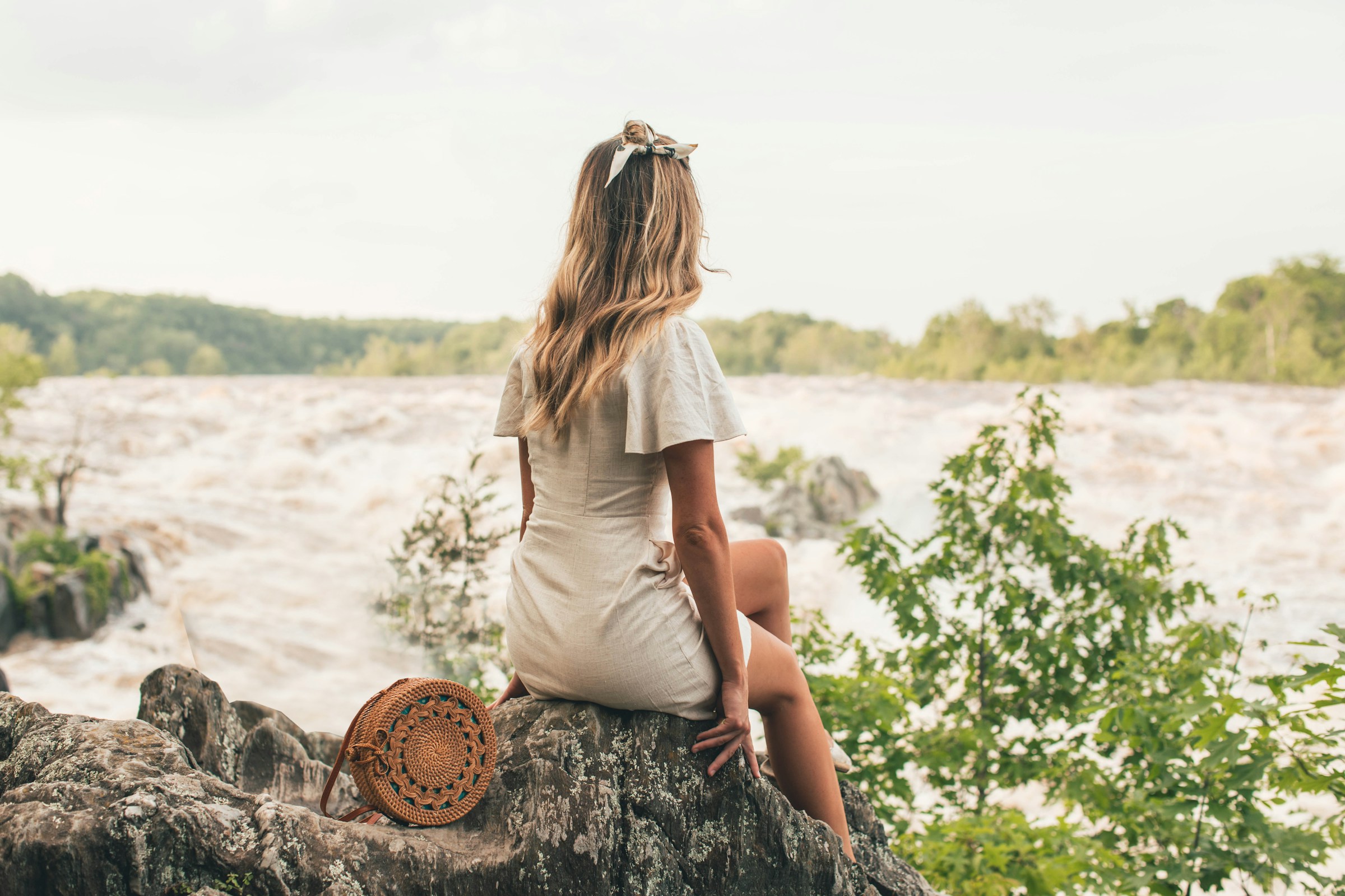 woman by lake - Fall Outfit Inspo