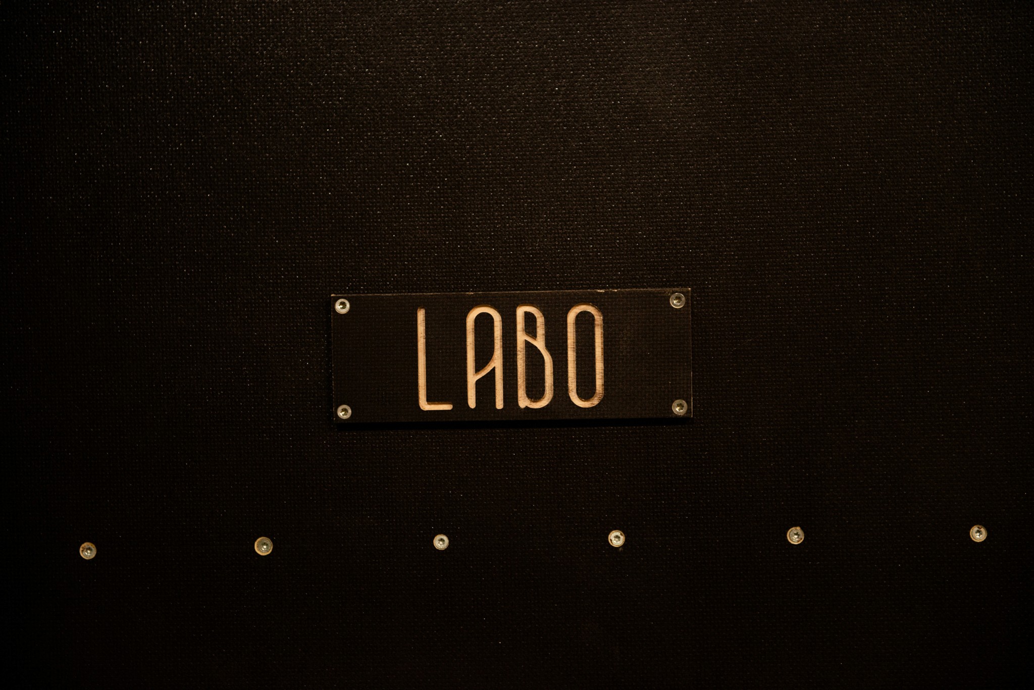 A close-up shot of a March calendar on a wooden desk.