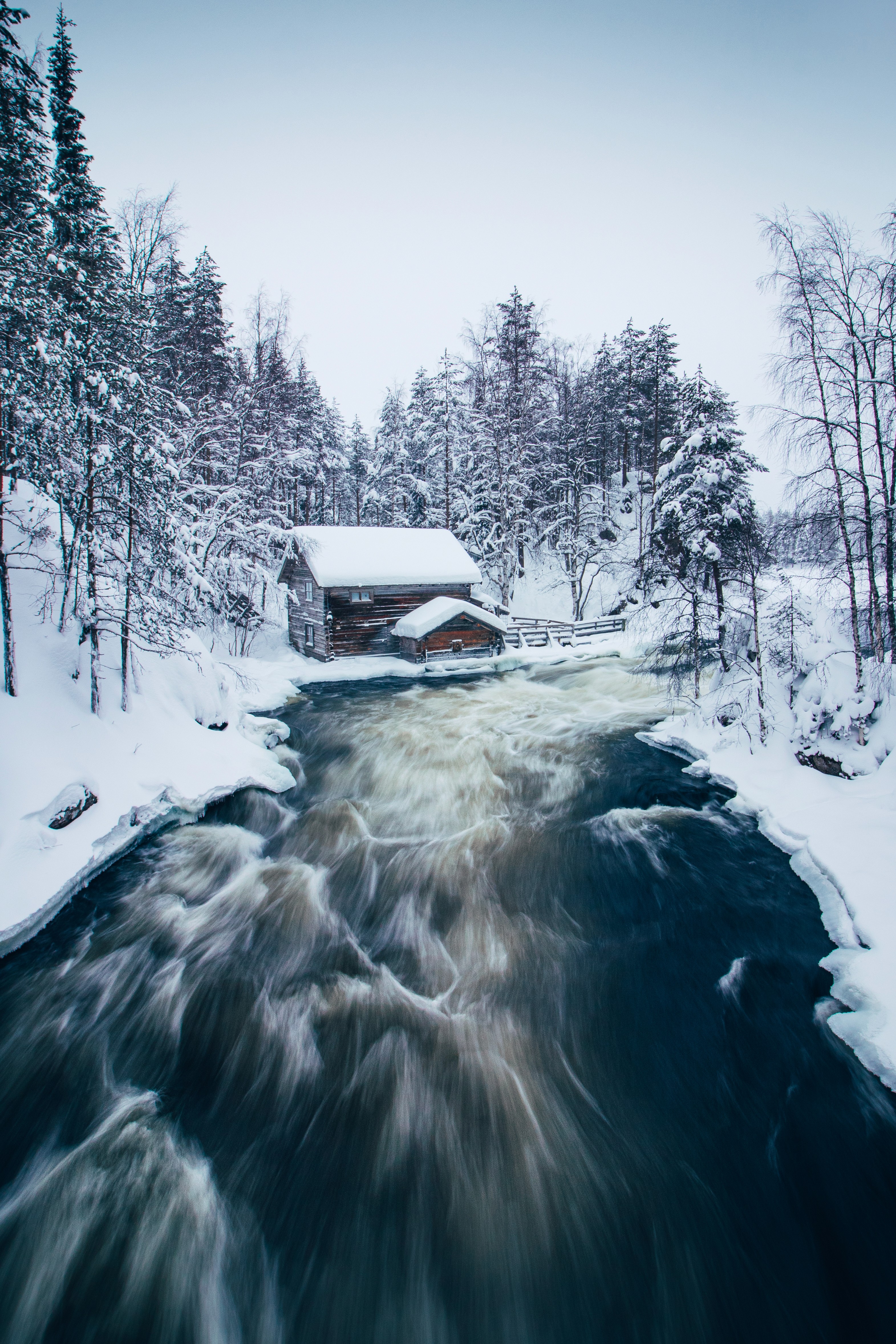 lady checking her phone and smiling