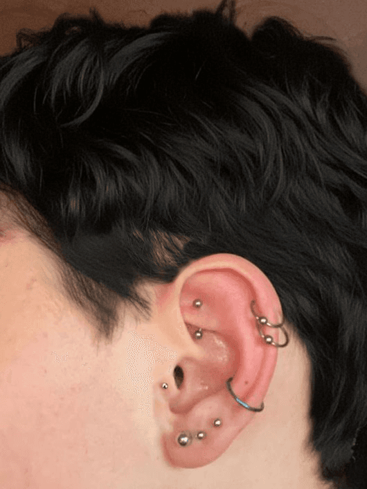 tatuaggio sull'avambraccio in stile chicano