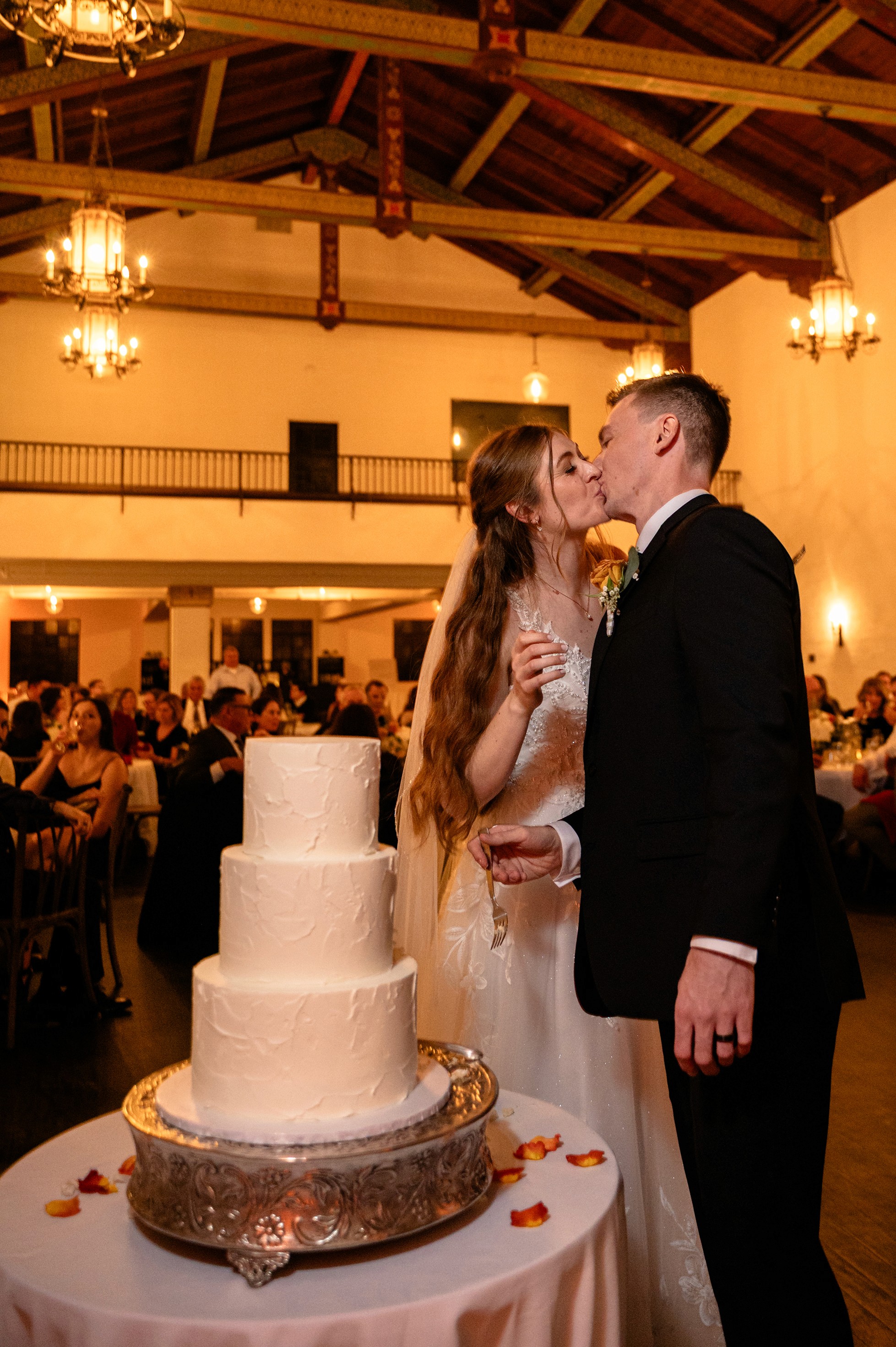 Flat lay wedding details with bouquet, rings, and sparkling bridal heels