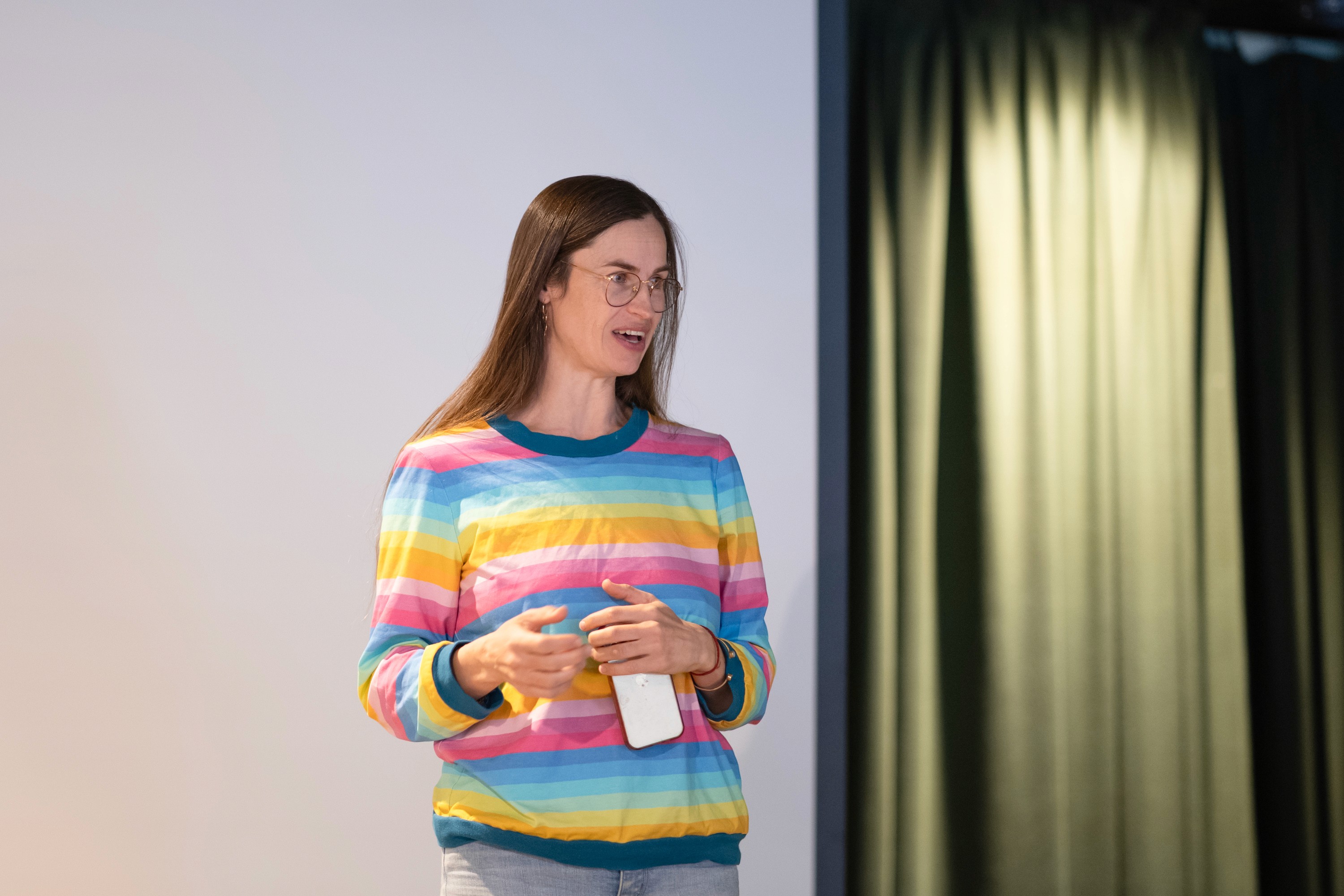 A women talking on a stage