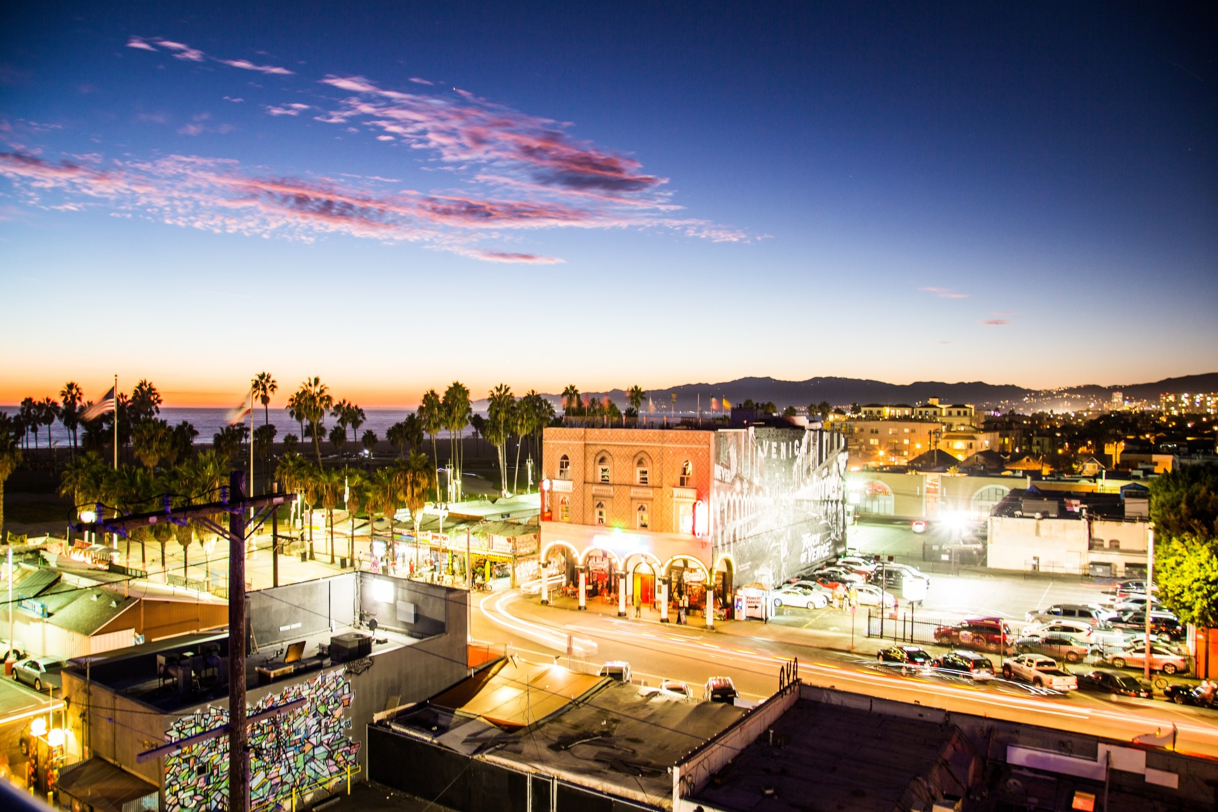 TRAVEL · City lights at dusk.
