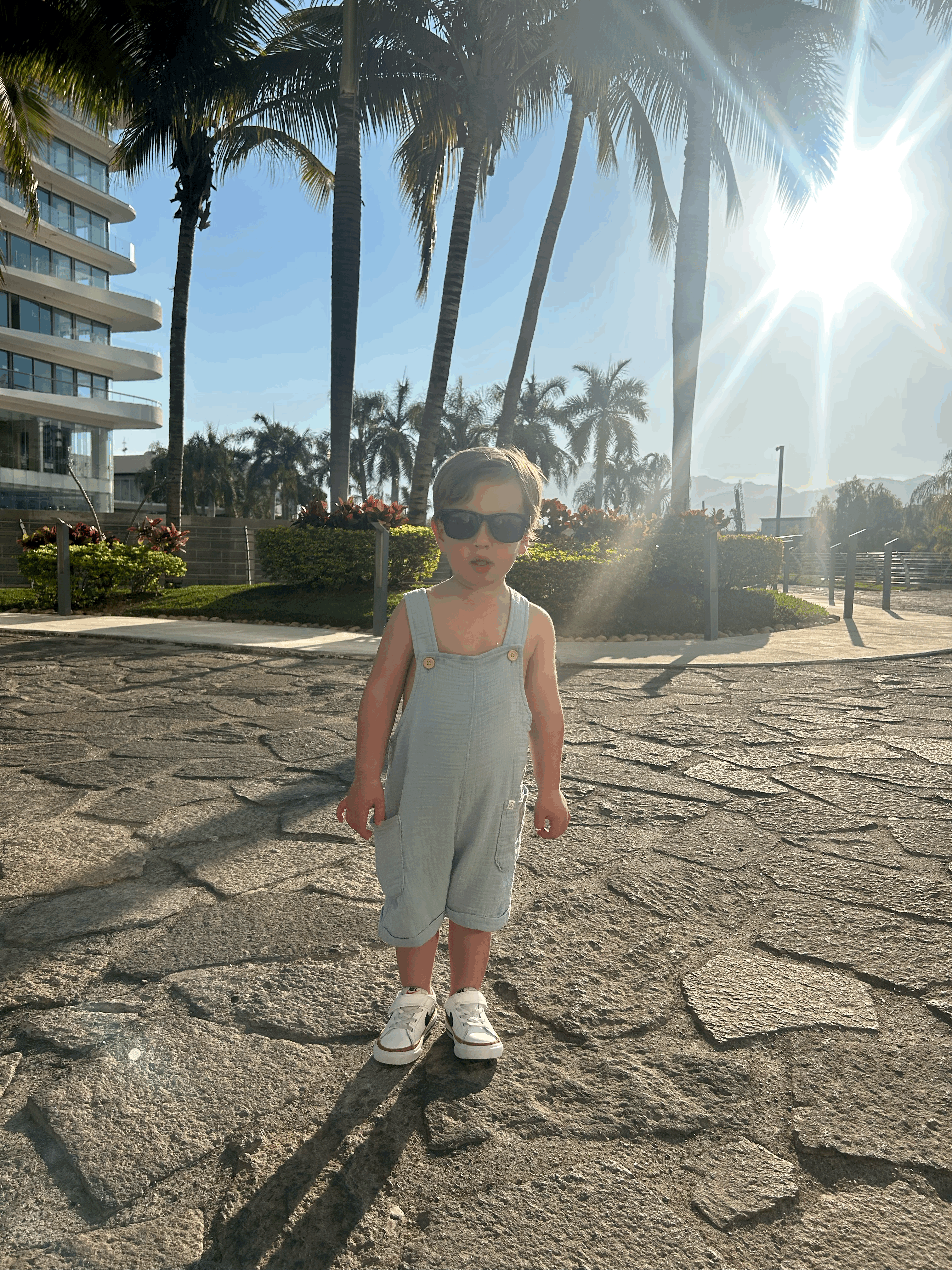 Outdoor Café Seating in a Sunlit Alley