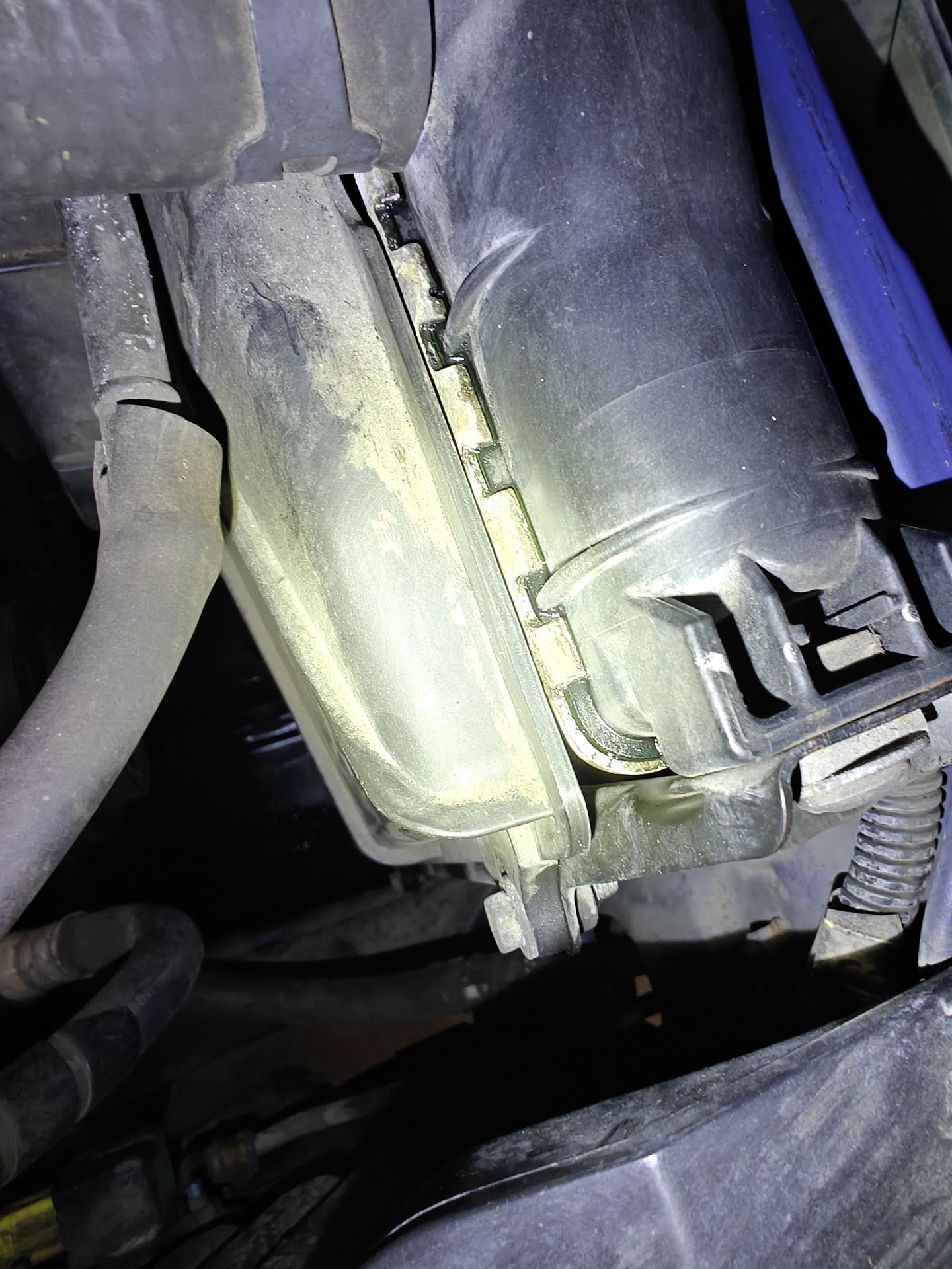 Green coolant residue along the seam of the Tacoma’s radiator tank